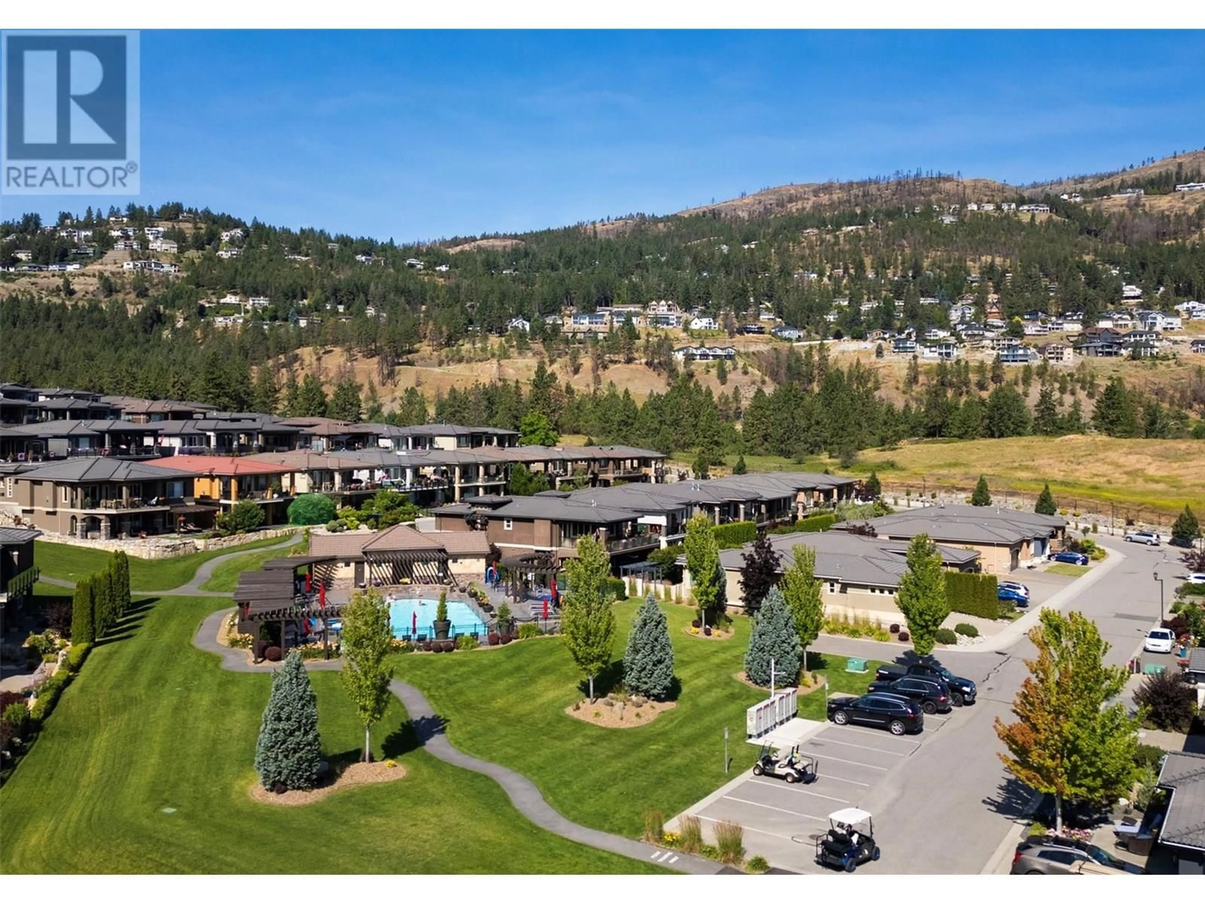 A pic from outside/outdoor area/front of a property/back of a property/a pic from drone, mountain view for 1559 HARBOUR GREEN ROAD, Kelowna British Columbia V1Z4E1