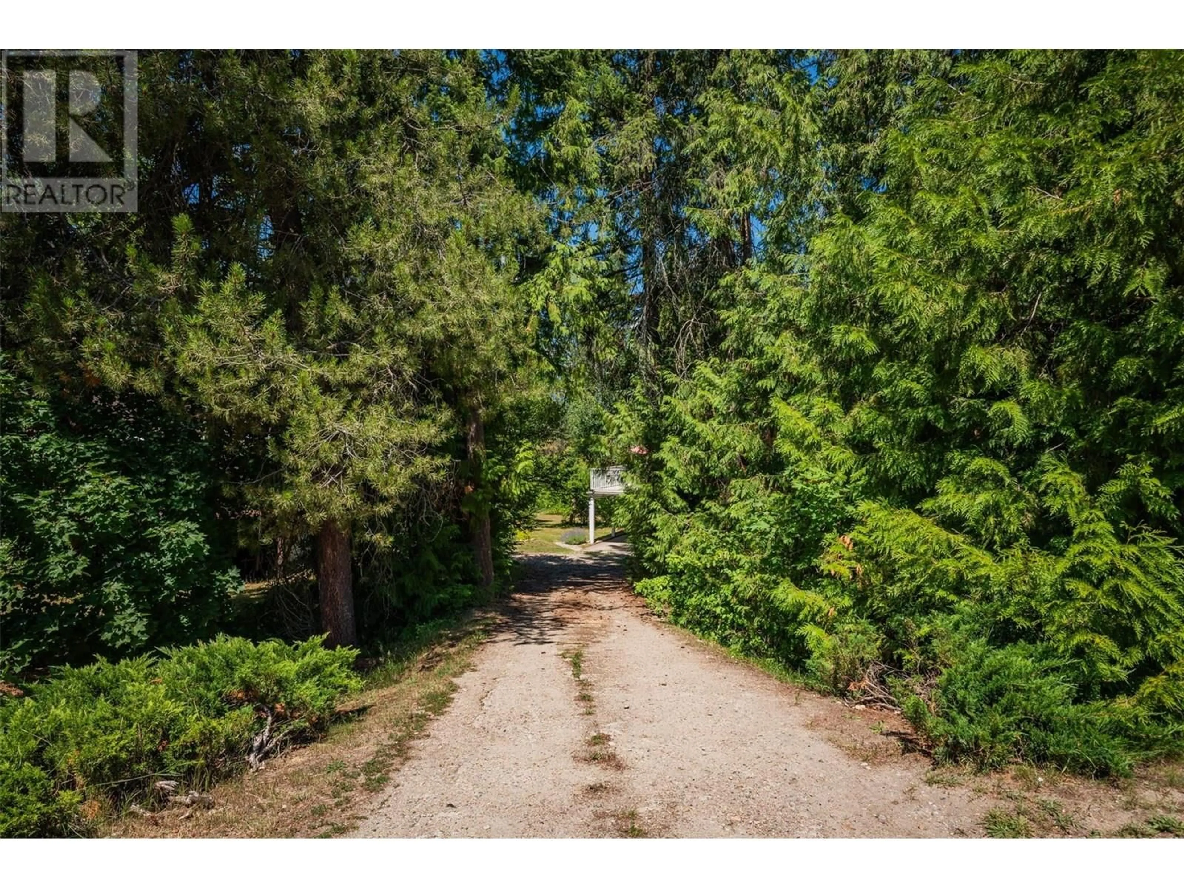 A pic from outside/outdoor area/front of a property/back of a property/a pic from drone, forest/trees view for 1669 RIDGEWOOD DRIVE, Castlegar British Columbia V1N2L5