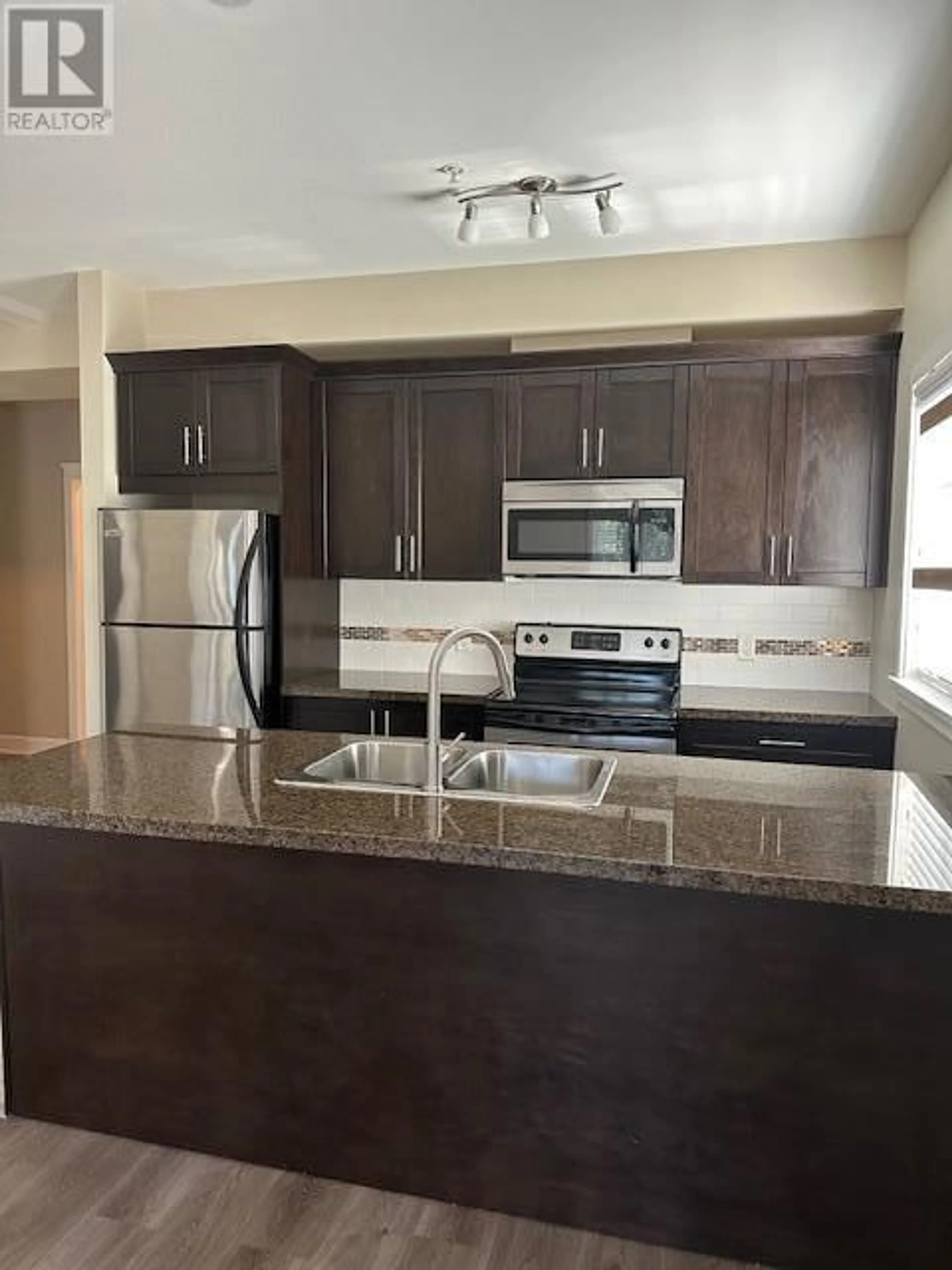 Standard kitchen, unknown for 104 - 2799 CLAPPERTON AVENUE, Merritt British Columbia V1K1A2
