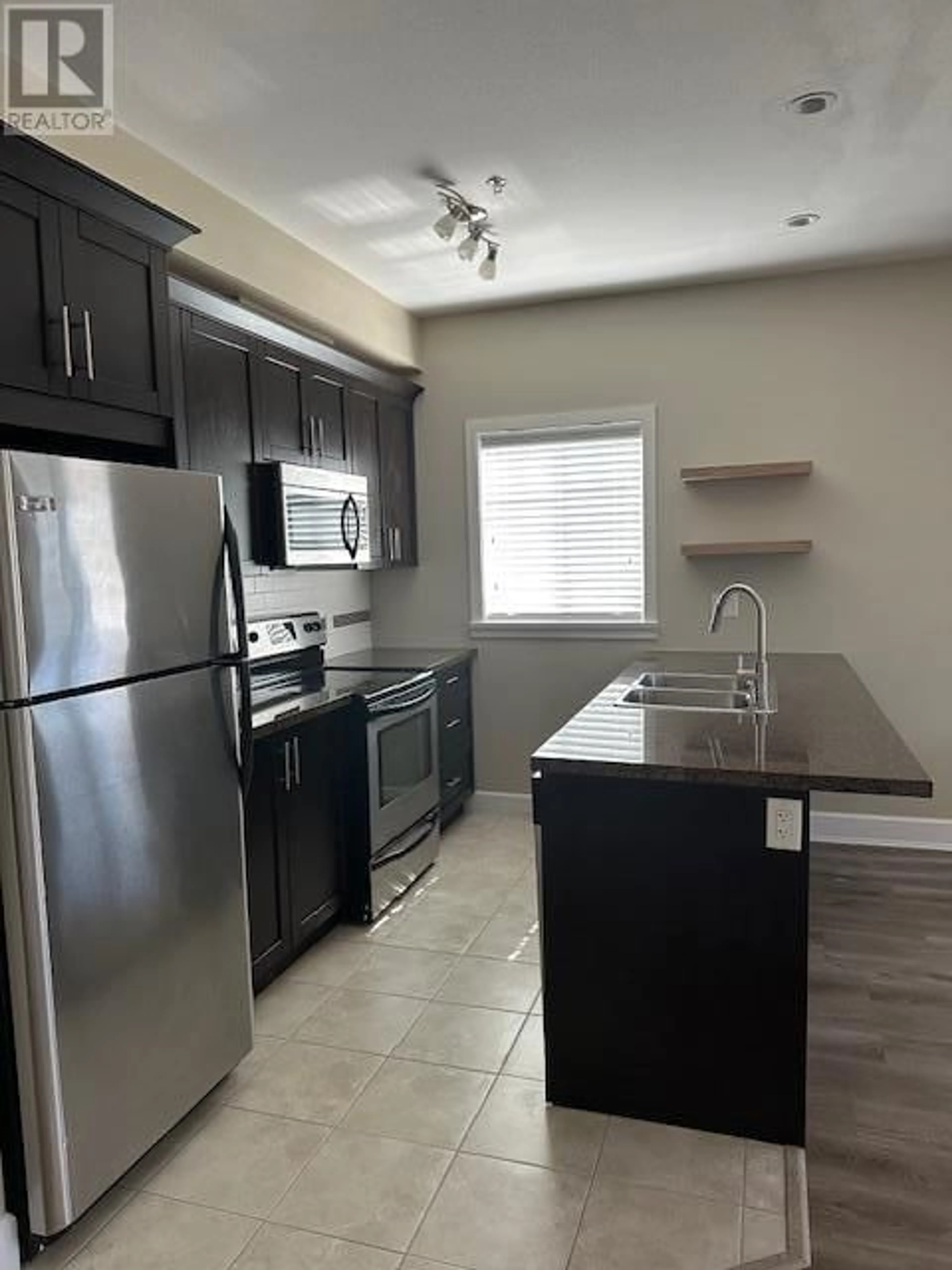Standard kitchen, unknown for 104 - 2799 CLAPPERTON AVENUE, Merritt British Columbia V1K1A2