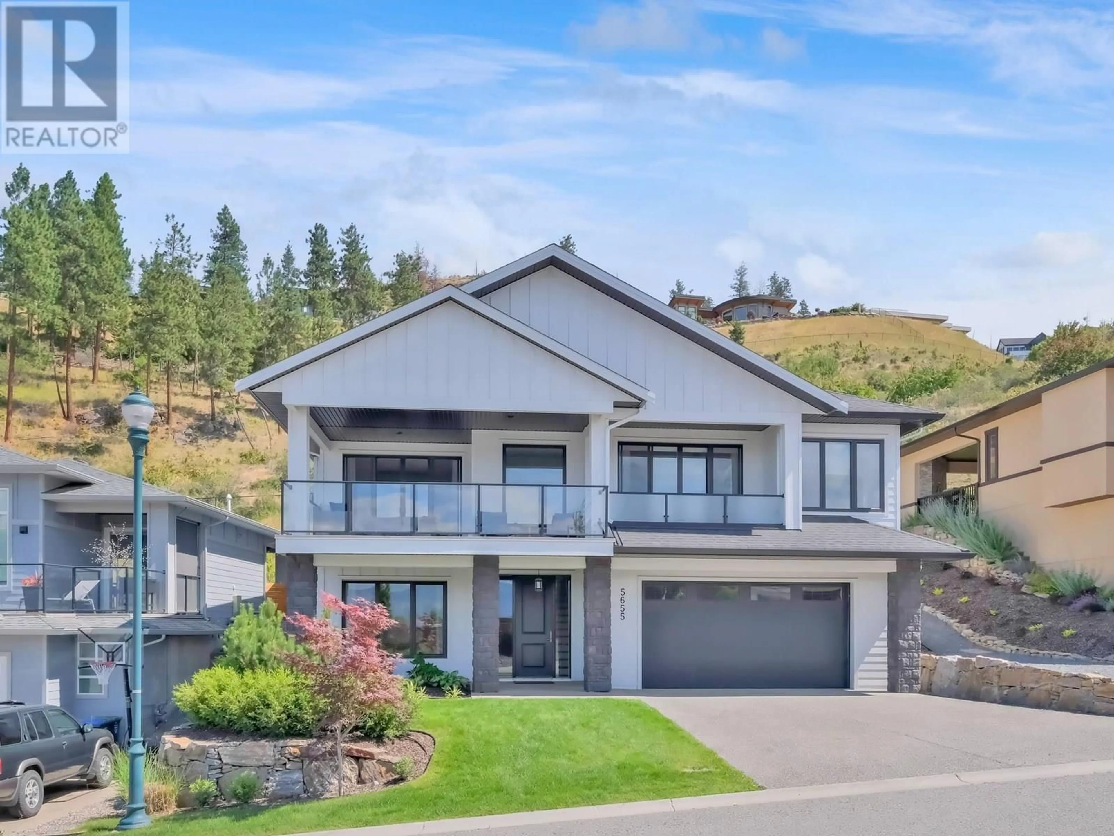 Home with vinyl exterior material, mountain view for 5655 JASPER WAY, Kelowna British Columbia V1W5L7