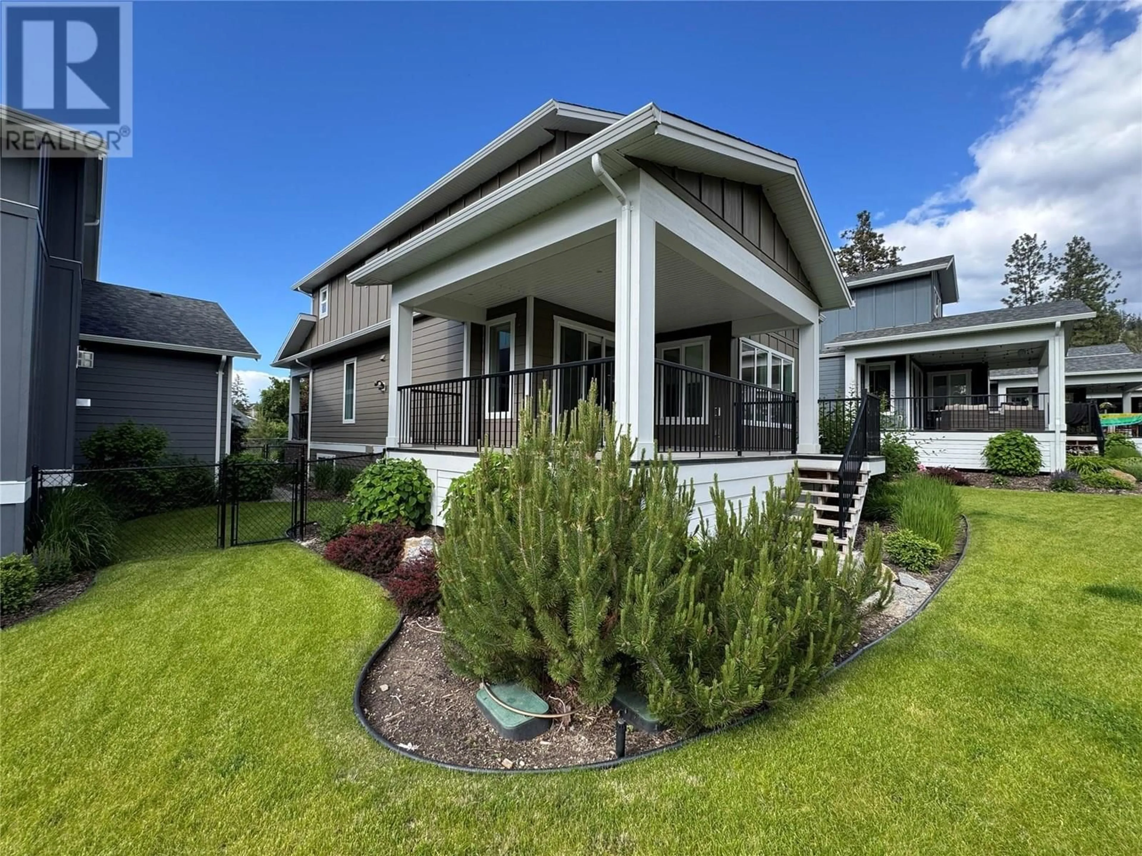 Home with vinyl exterior material, street for 4651 RAYMER ROAD, Kelowna British Columbia V1W1J4