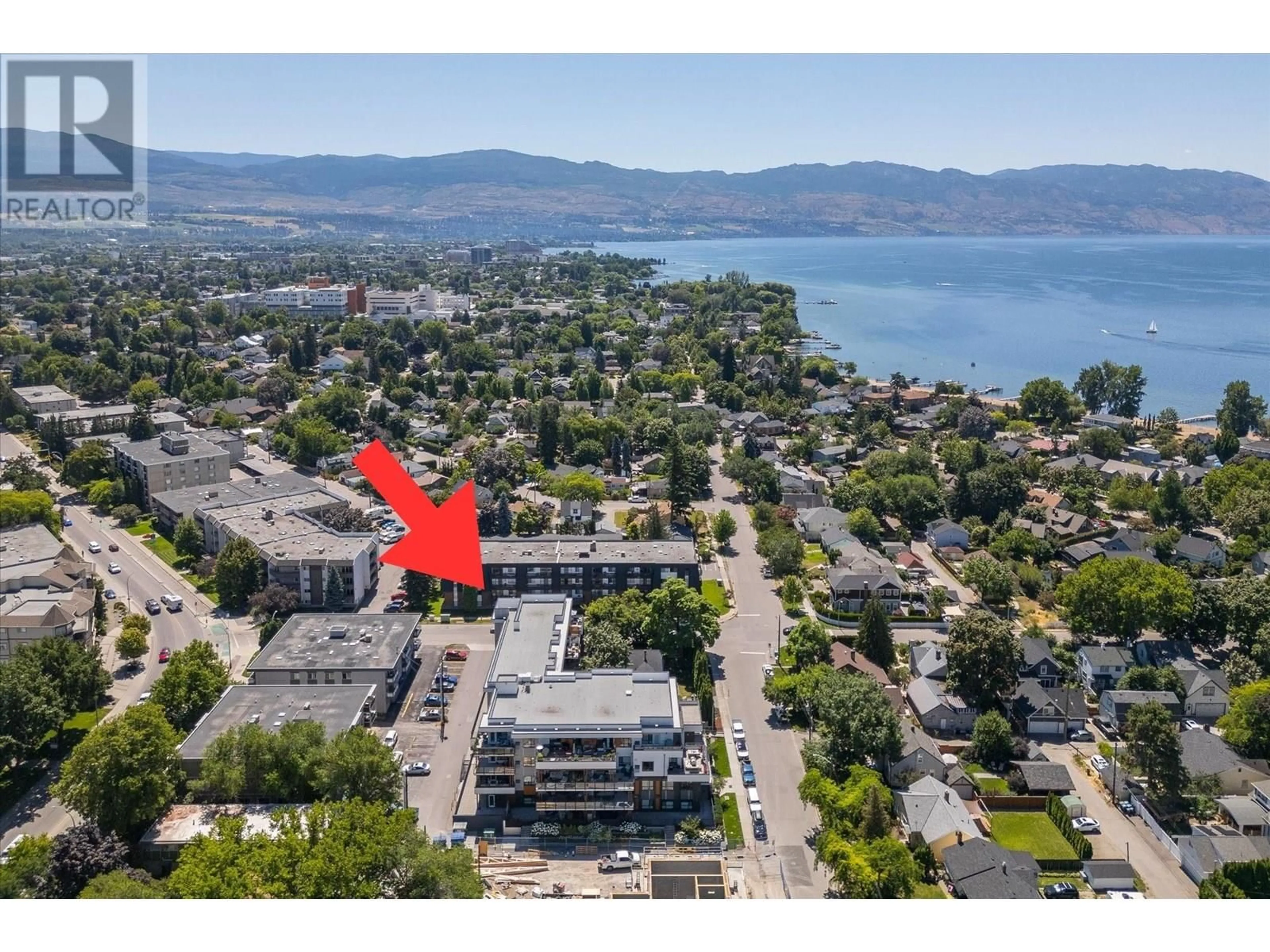 A pic from outside/outdoor area/front of a property/back of a property/a pic from drone, water/lake/river/ocean view for 105 - 1883 WATER STREET, Kelowna British Columbia V1Y1K4