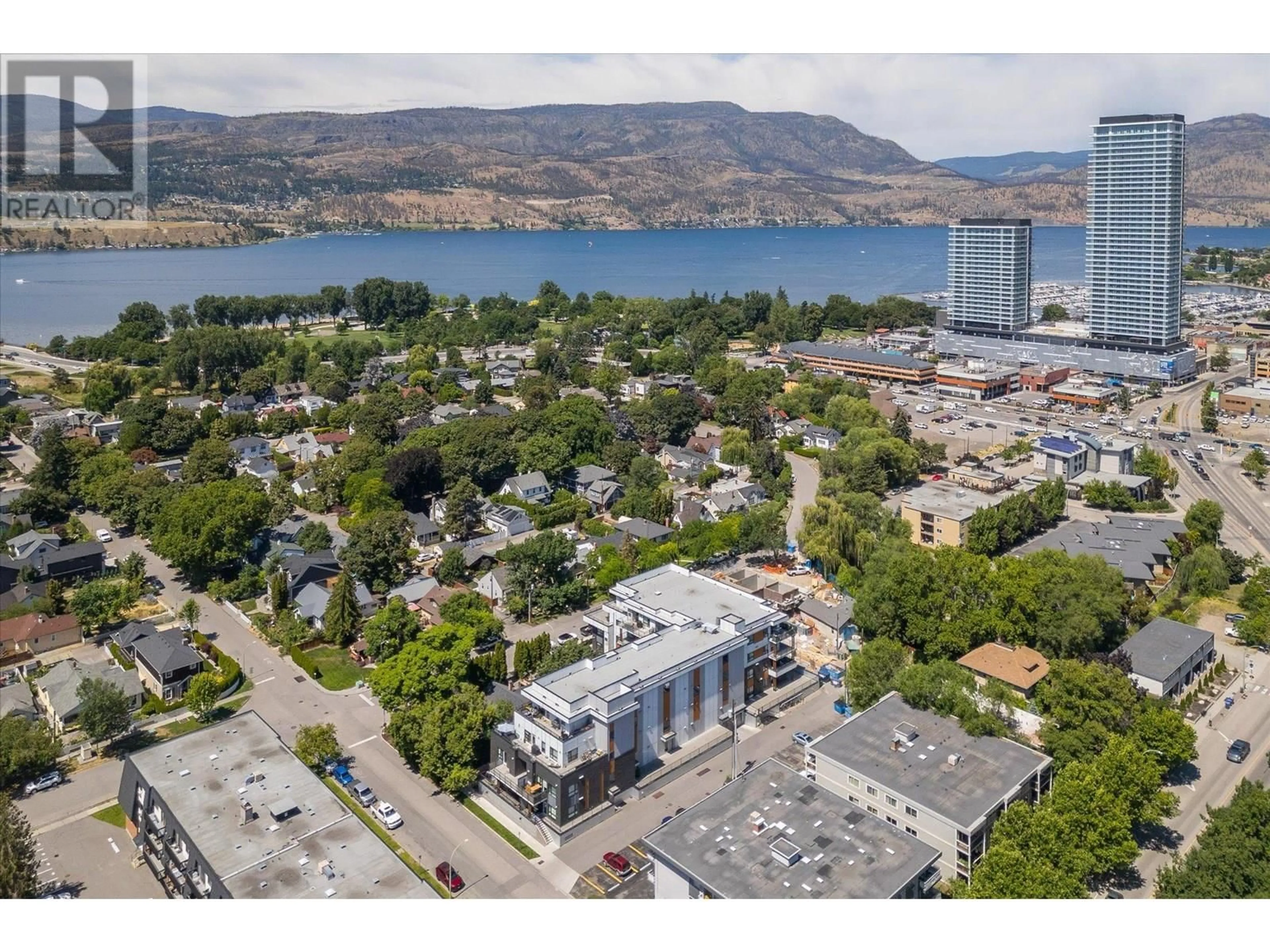 A pic from outside/outdoor area/front of a property/back of a property/a pic from drone, unknown for 105 - 1883 WATER STREET, Kelowna British Columbia V1Y1K4