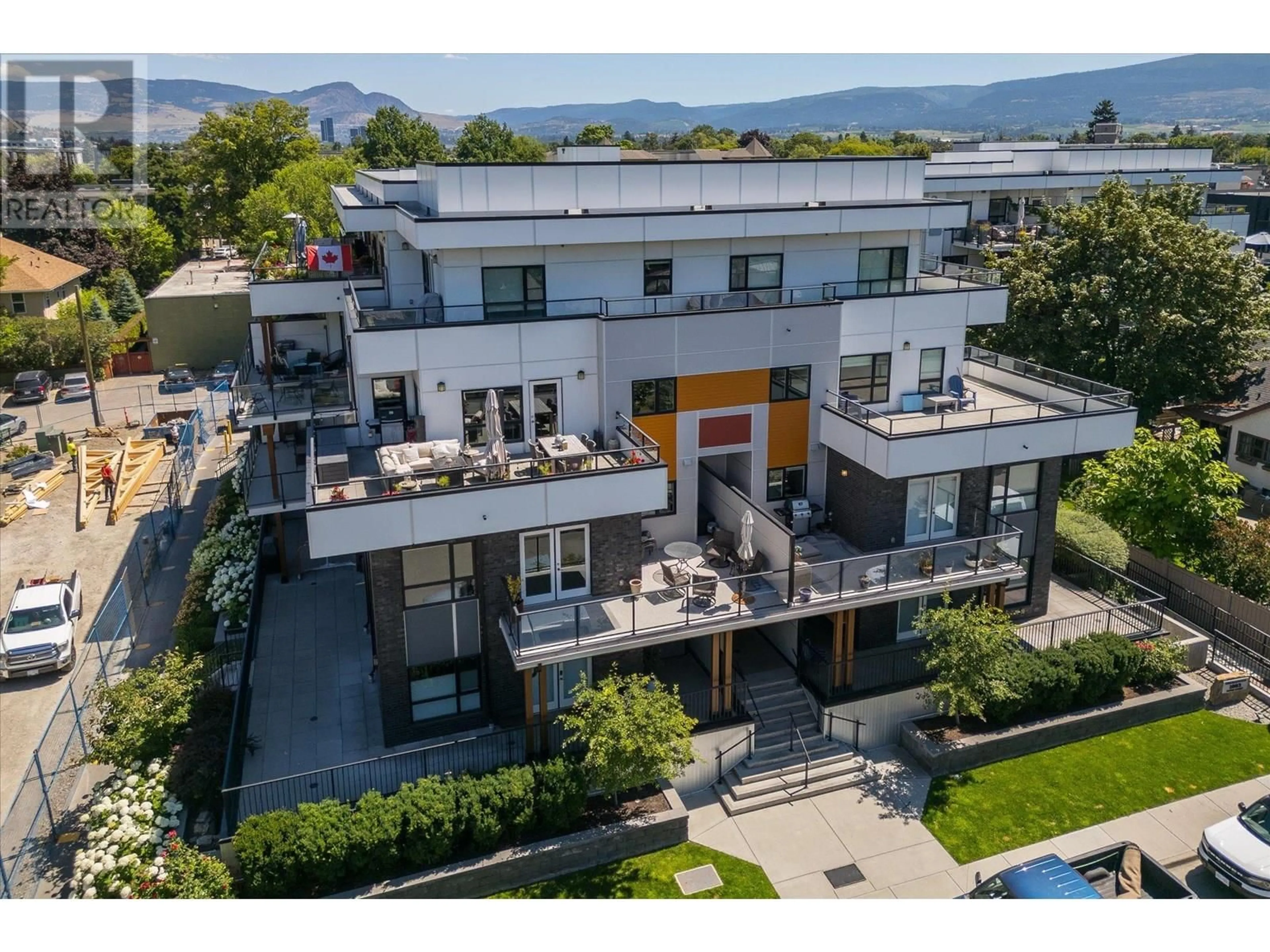 A pic from outside/outdoor area/front of a property/back of a property/a pic from drone, unknown for 105 - 1883 WATER STREET, Kelowna British Columbia V1Y1K4