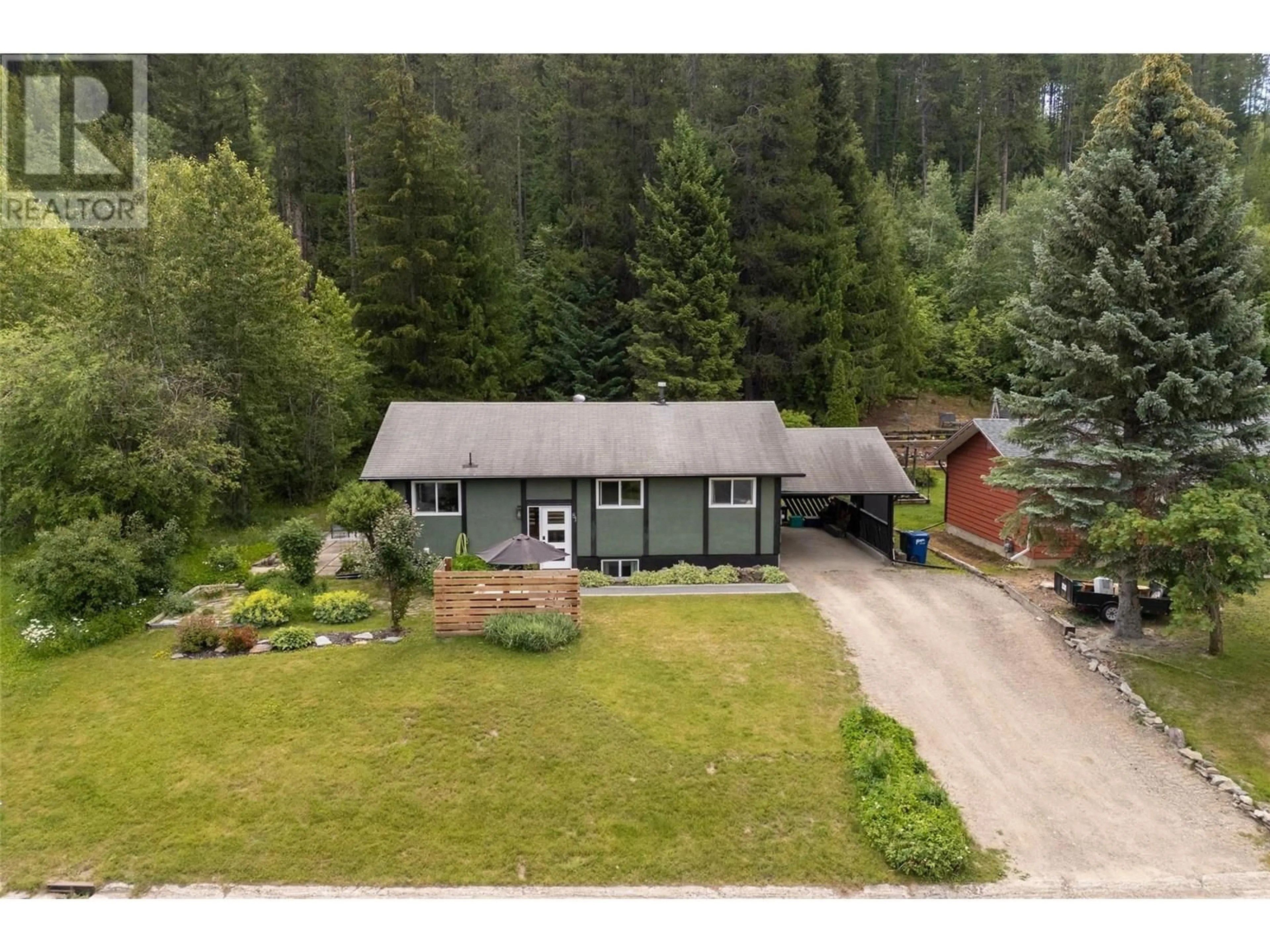 A pic from outside/outdoor area/front of a property/back of a property/a pic from drone, forest/trees view for 81 RIDGEMONT LANE, Fernie British Columbia V0B1M2