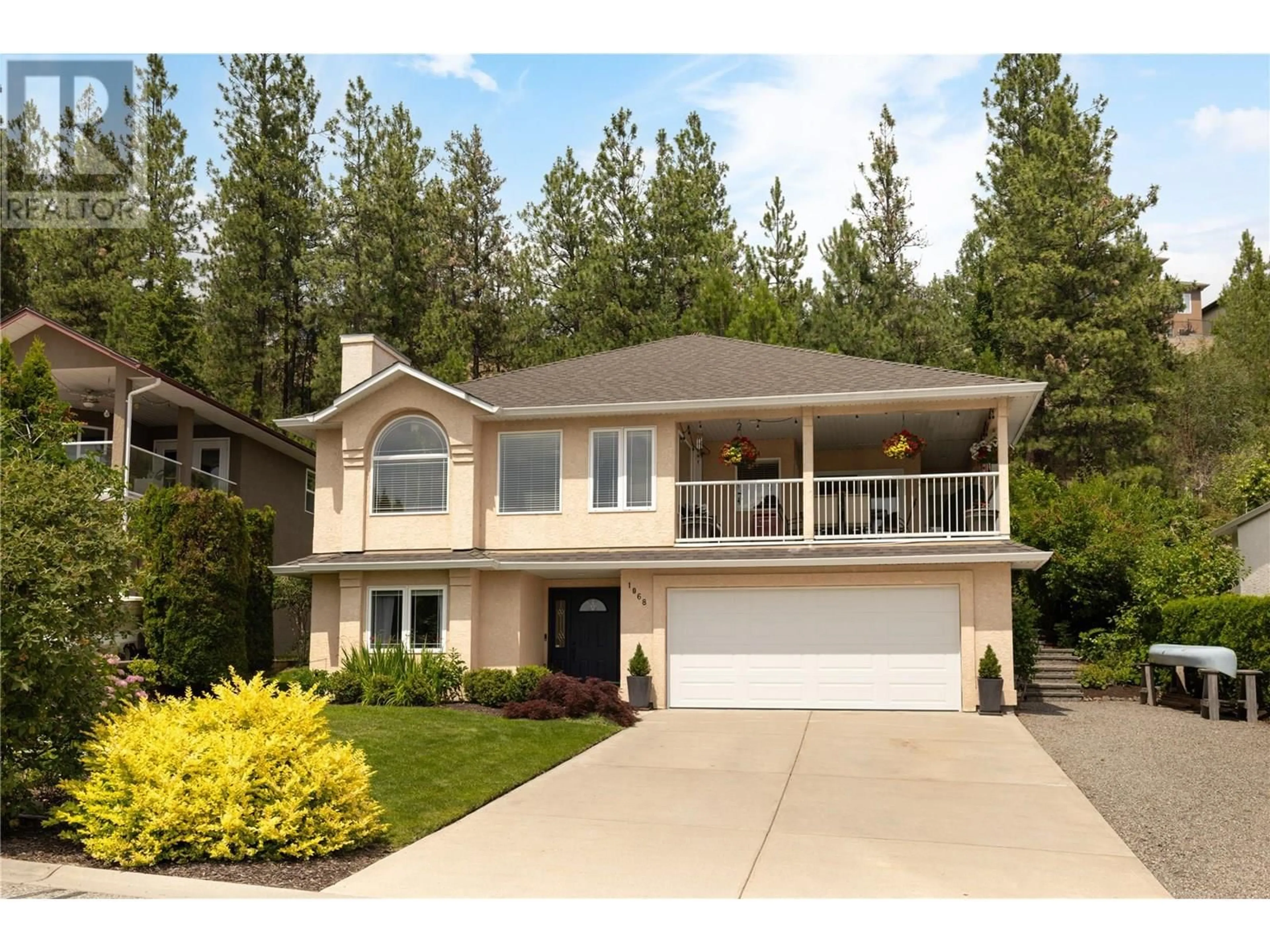 Home with vinyl exterior material, street for 1068 CALEDONIA WAY, West Kelowna British Columbia V1Z3N7