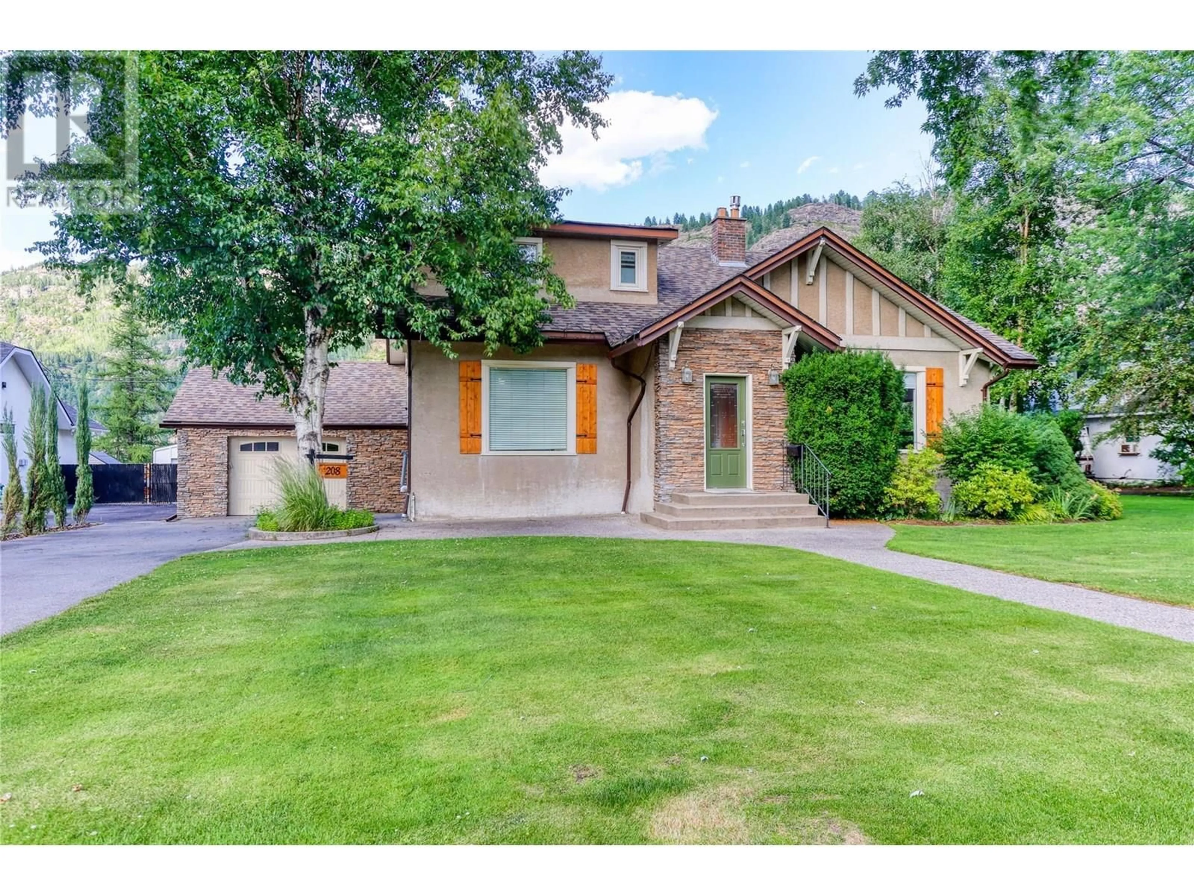 Home with brick exterior material, street for 208 RITCHIE AVENUE, Trail British Columbia V1R1H2