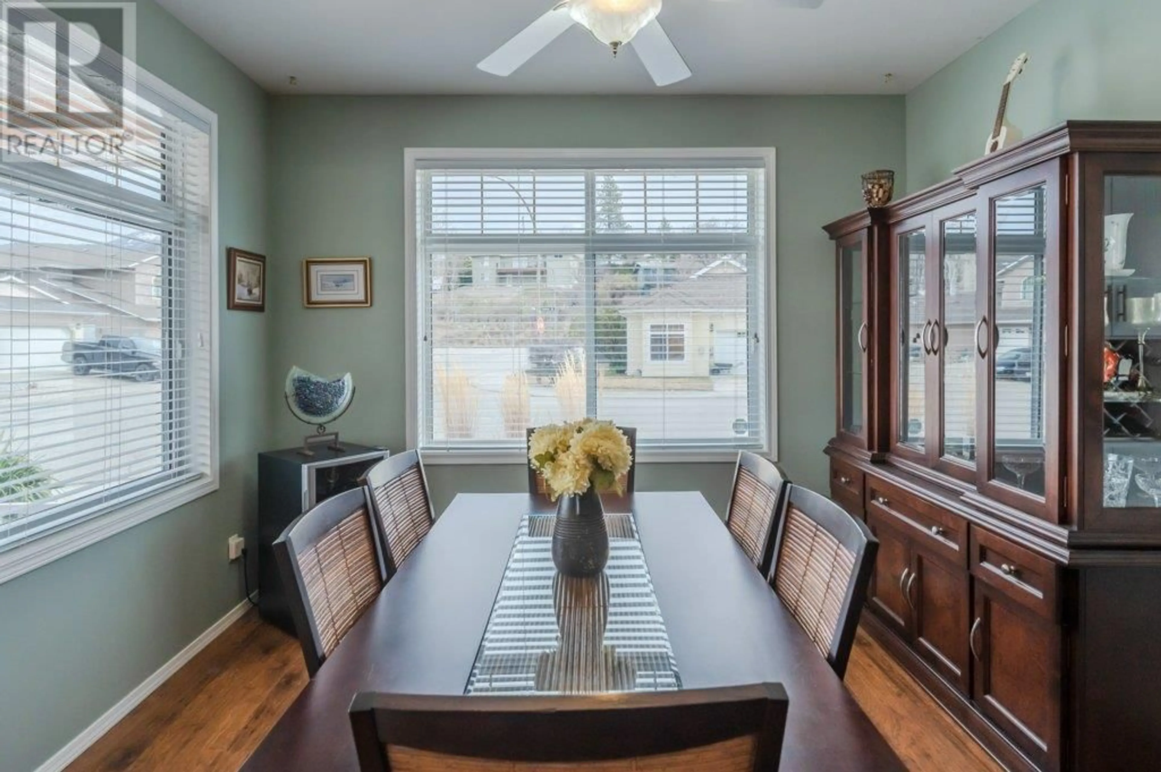 Dining room, wood/laminate floor for 247 WILLOWS PLACE, Oliver British Columbia V0H1T4