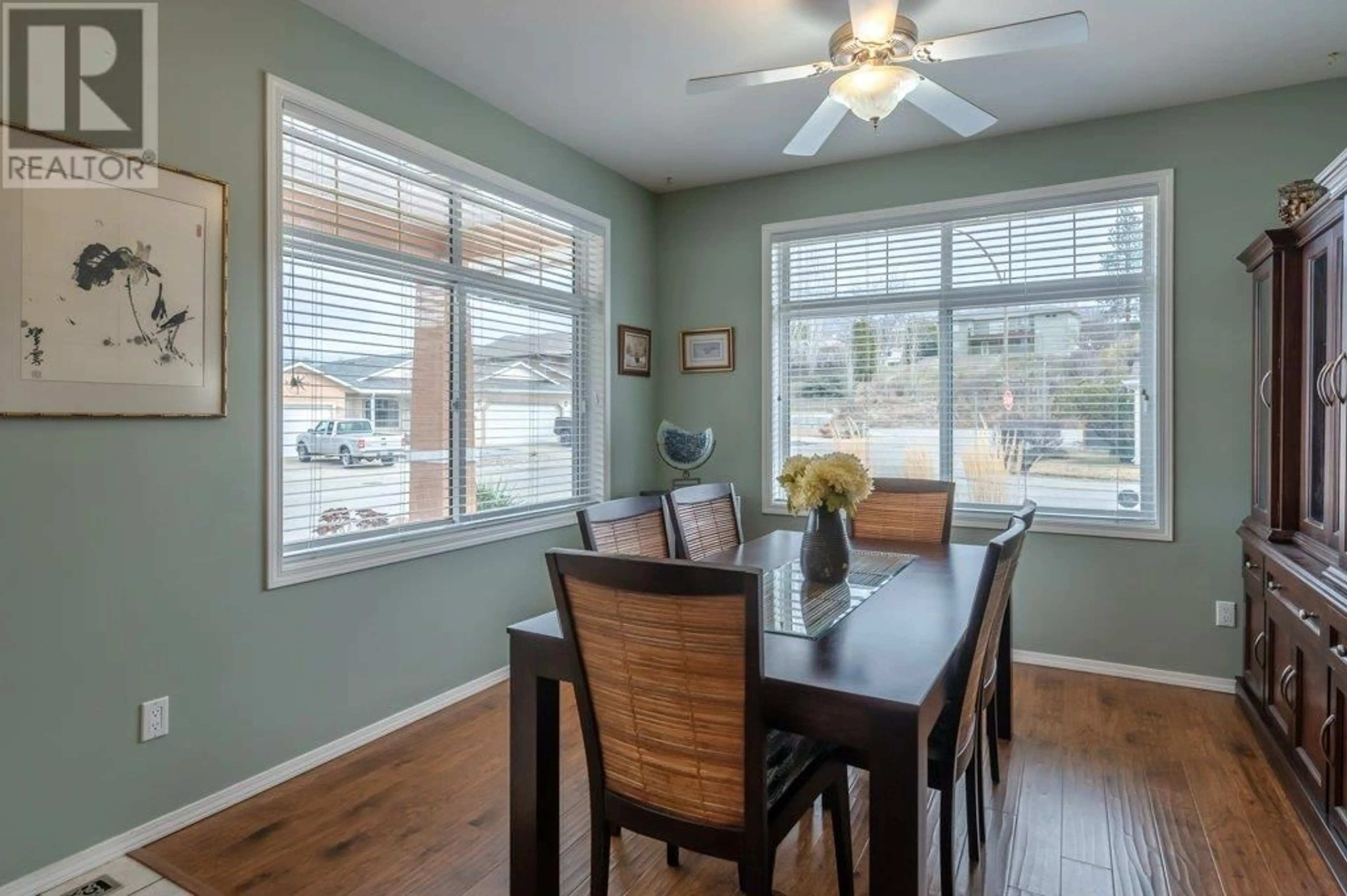 Dining room, wood/laminate floor for 247 WILLOWS PLACE, Oliver British Columbia V0H1T4
