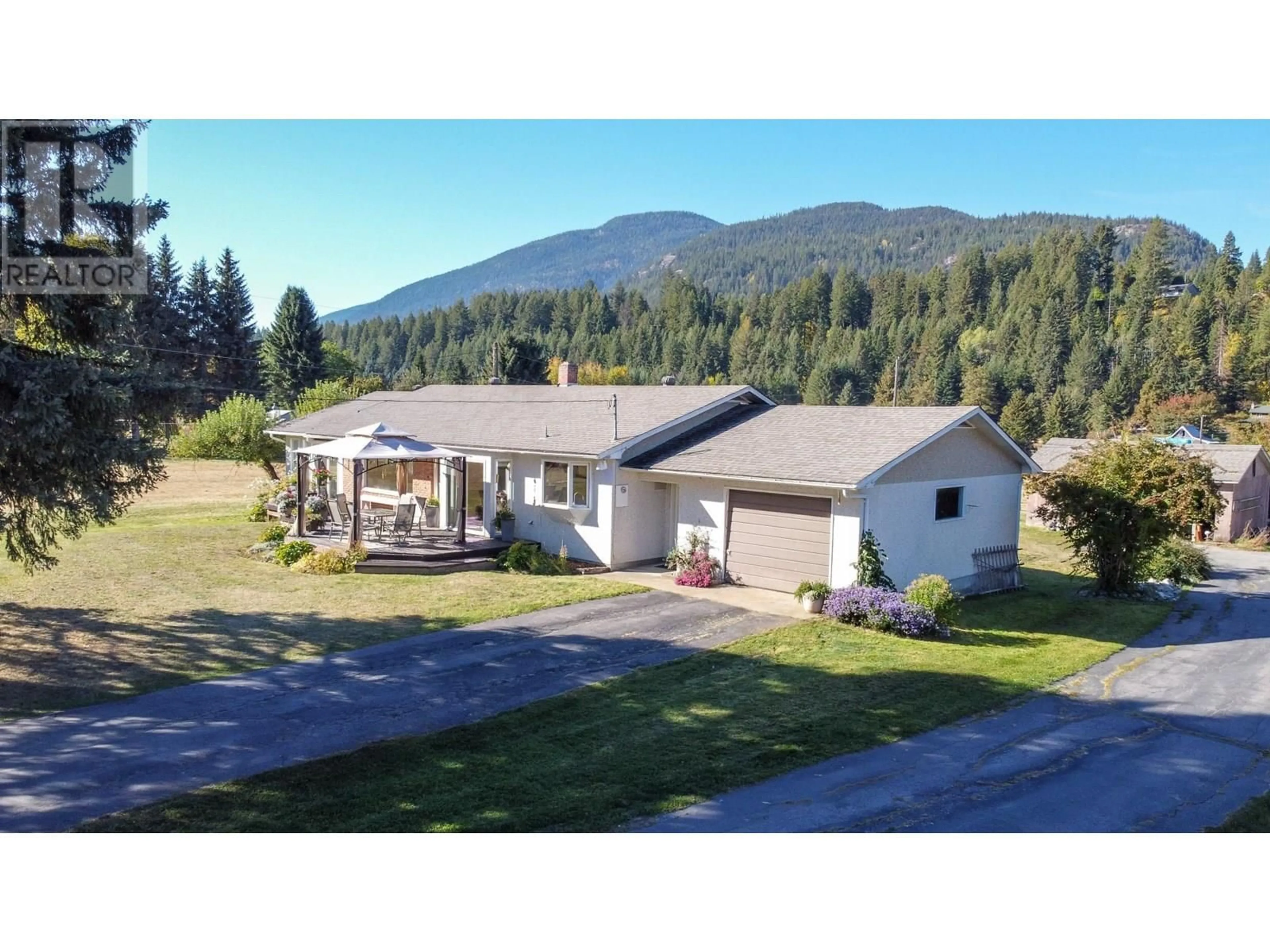 A pic from outside/outdoor area/front of a property/back of a property/a pic from drone, mountain view for 2697 SHOREACRES ROAD, Castlegar British Columbia V1N4R1