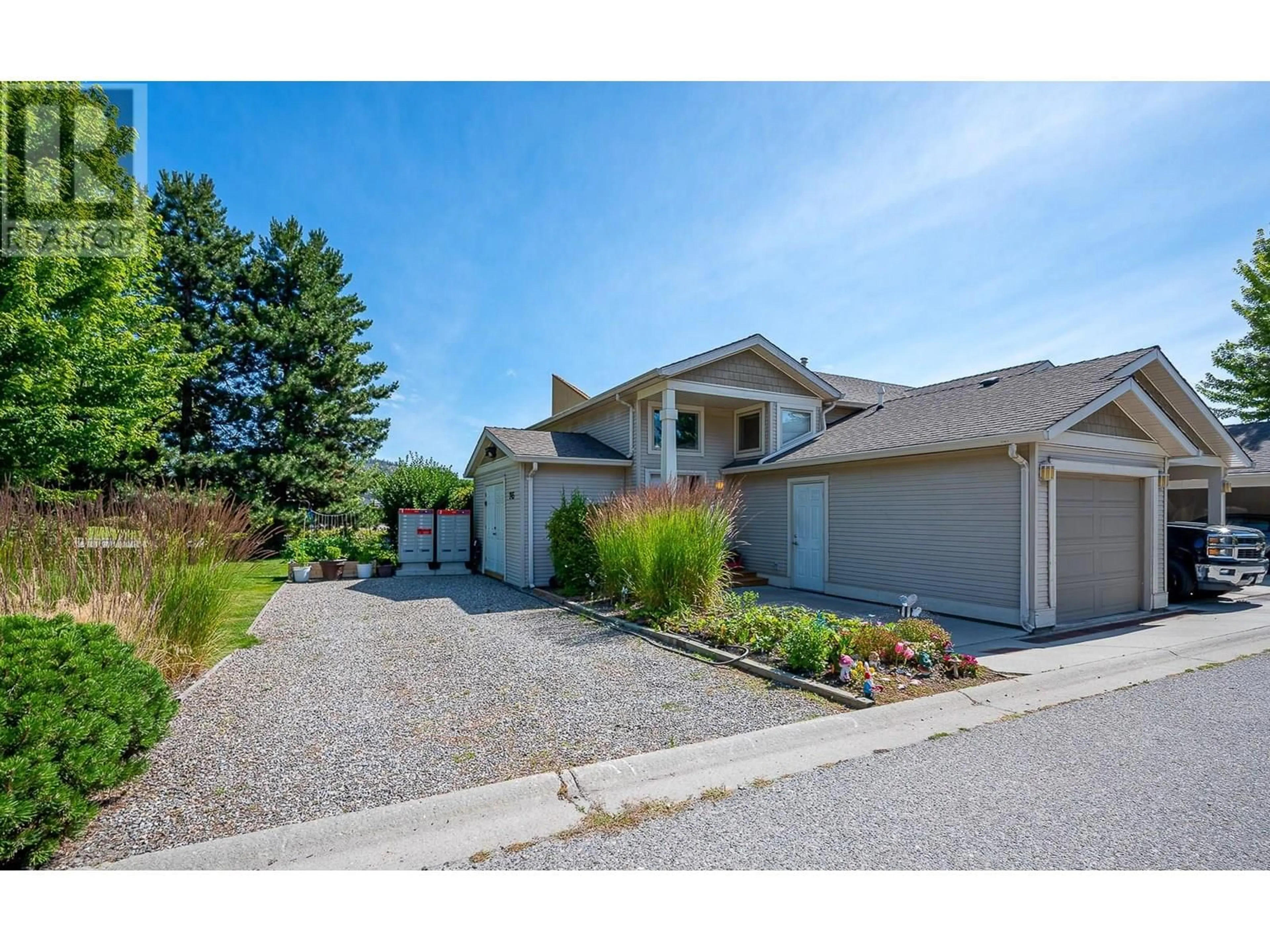 A pic from outside/outdoor area/front of a property/back of a property/a pic from drone, street for 101 - 245 SNOWSELL ROAD, Kelowna British Columbia V1V2T6