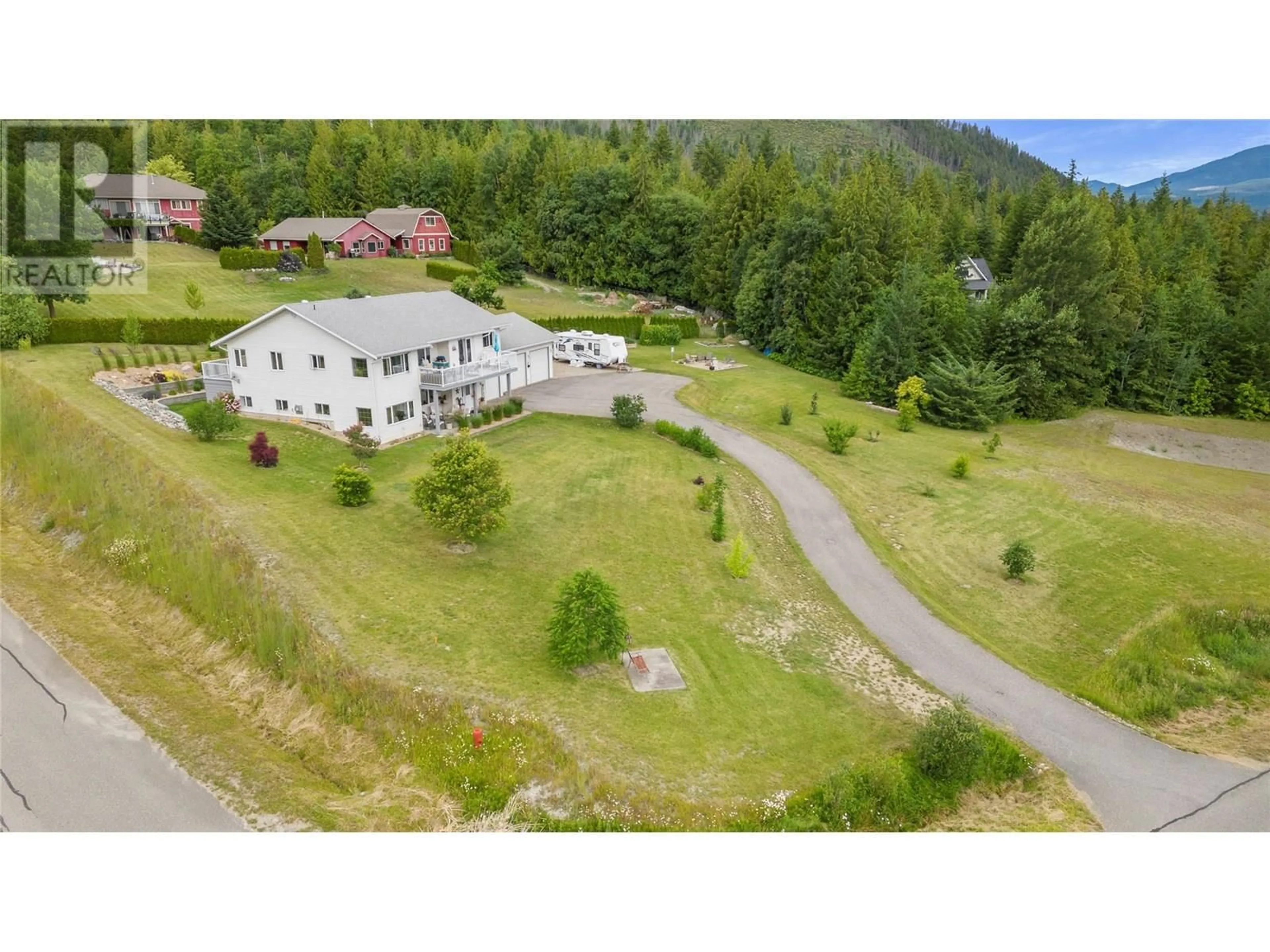 A pic from outside/outdoor area/front of a property/back of a property/a pic from drone, mountain view for 2190 COUNTRY WOODS ROAD, Sorrento British Columbia V0E2W1
