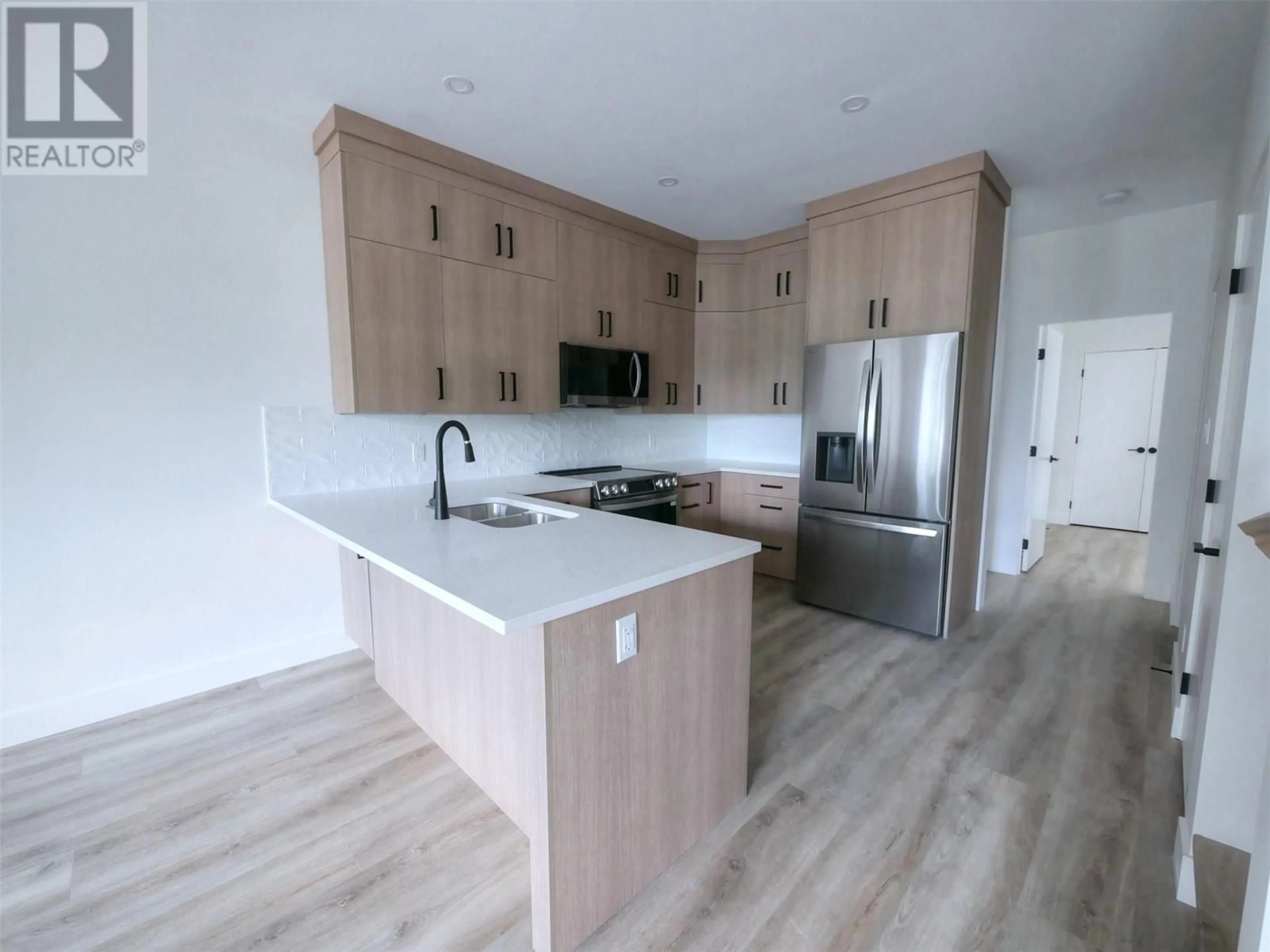 Open concept kitchen, unknown for 3 - 88 NELSON AVENUE SOUTH, Nakusp British Columbia V0G1R1