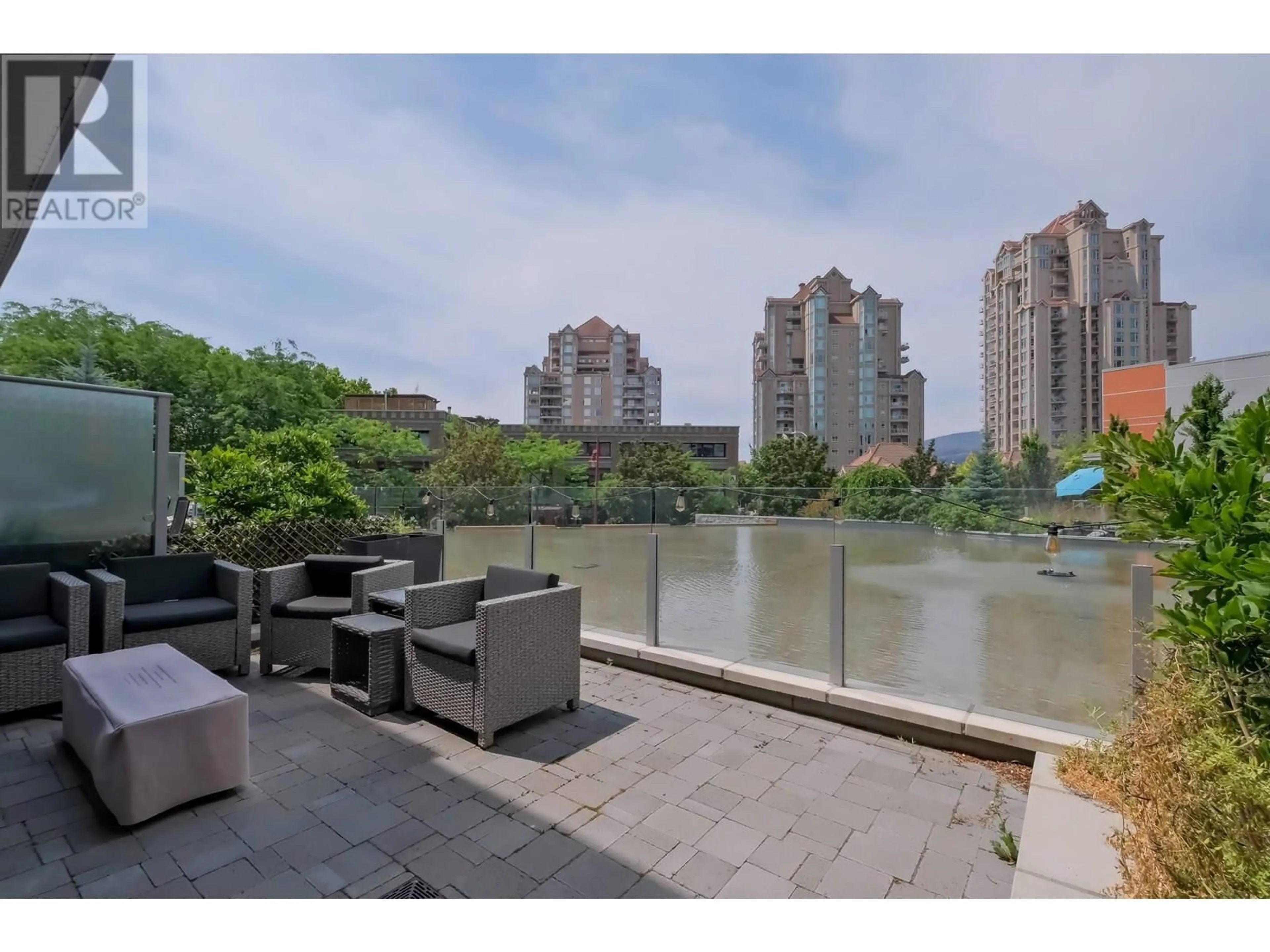 Patio, water/lake/river/ocean view for 106 - 1151 SUNSET DRIVE, Kelowna British Columbia V1Y0G2