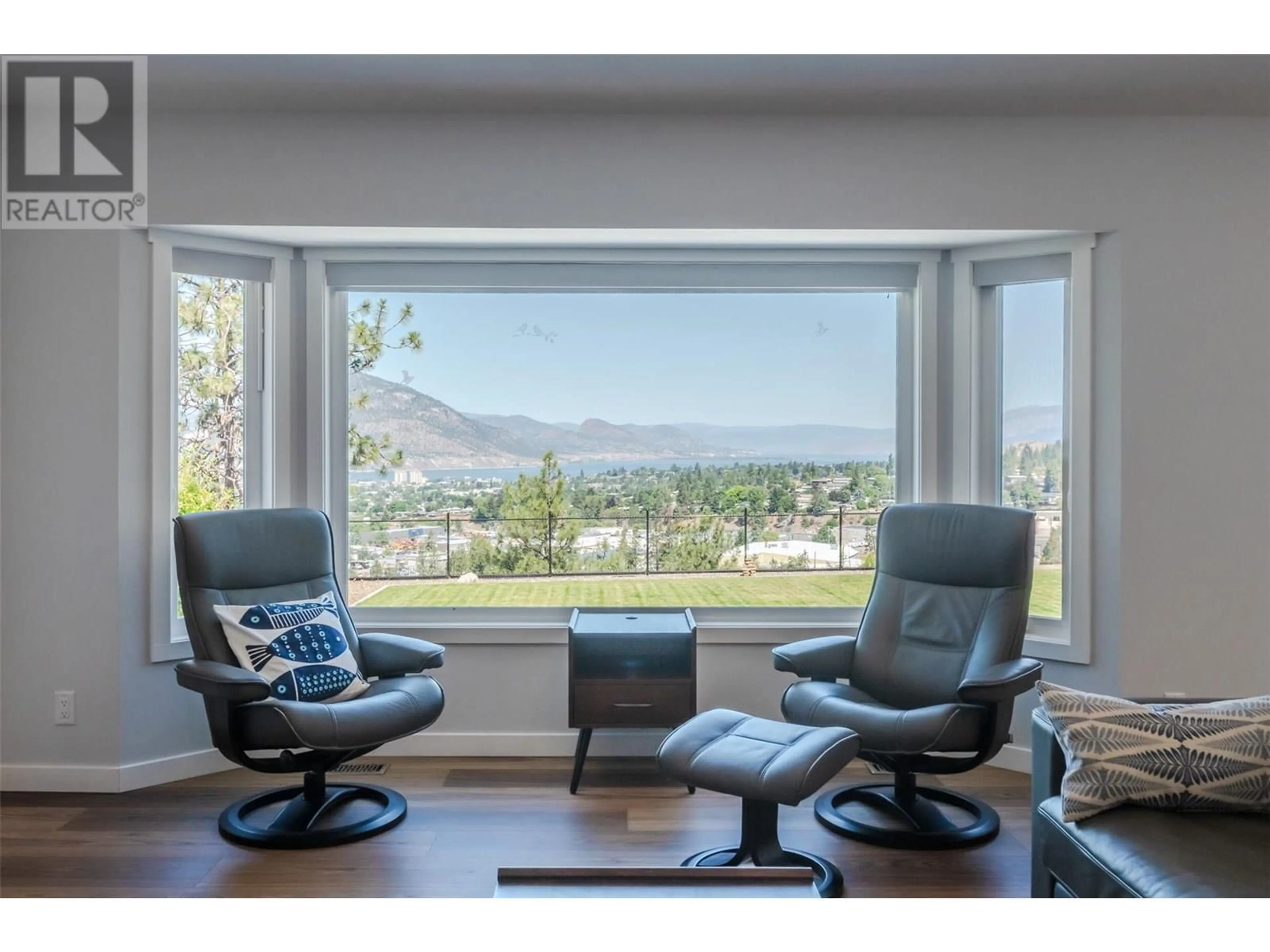 Living room with furniture, wood/laminate floor for 153 WESTVIEW DRIVE, Penticton British Columbia V2A7V9