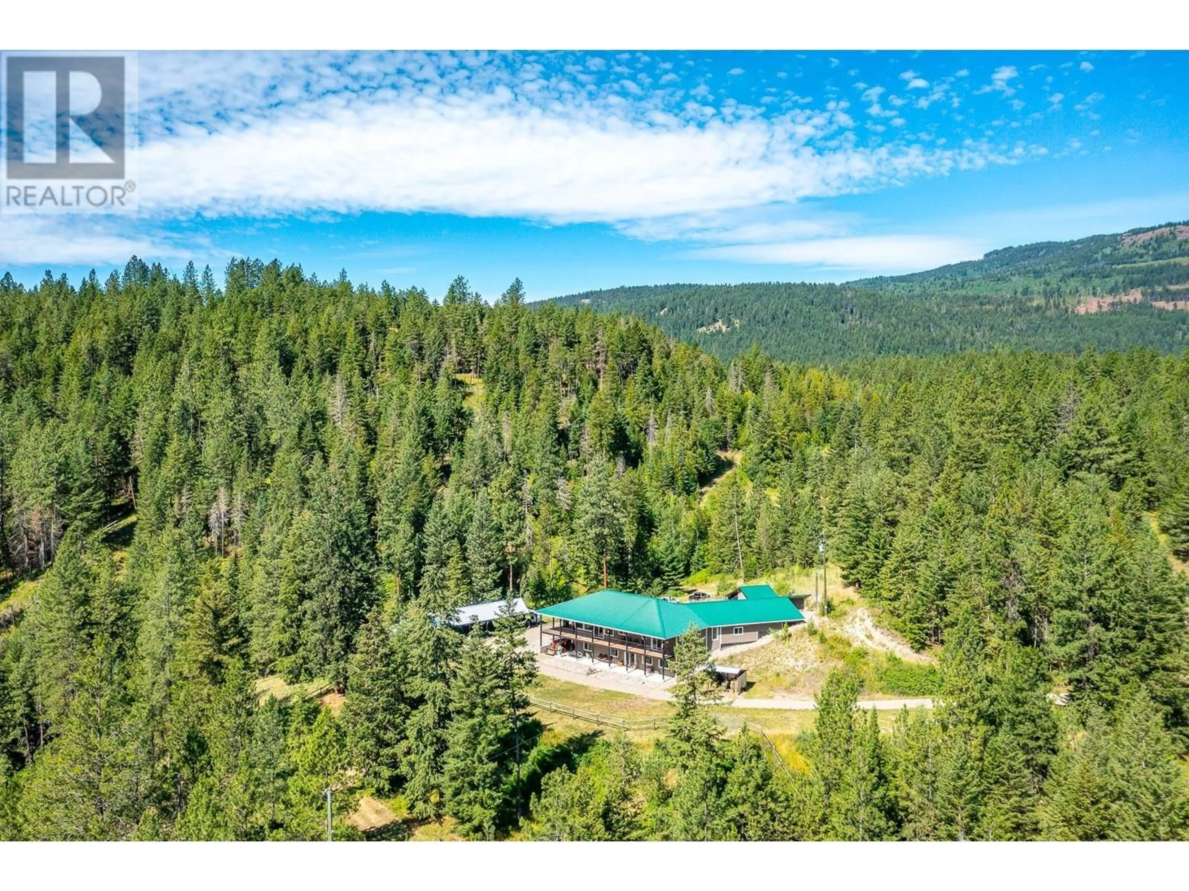 A pic from outside/outdoor area/front of a property/back of a property/a pic from drone, forest/trees view for 3186 SALMON RIVER ROAD, Salmon Arm British Columbia V1E3H9