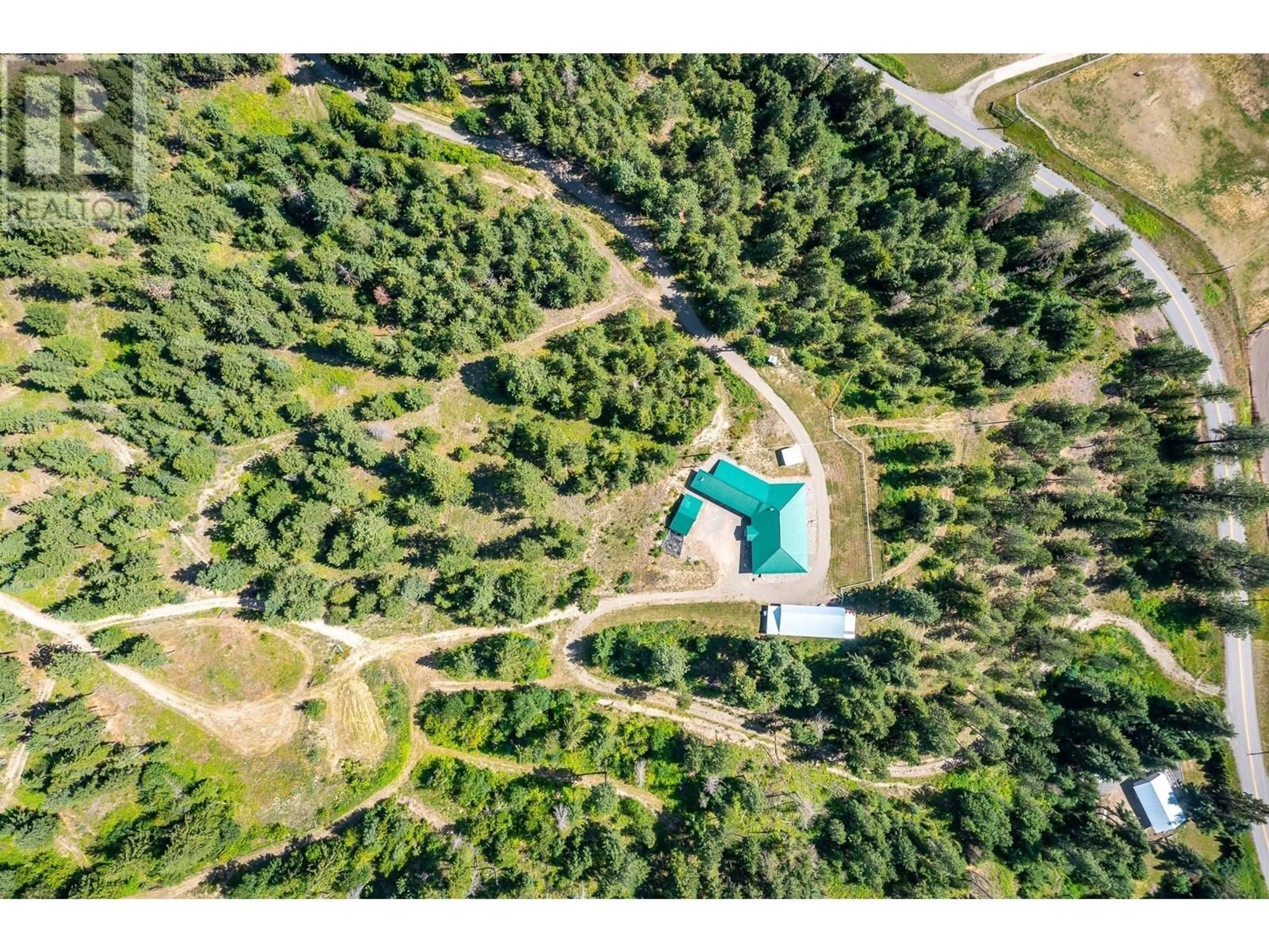 A pic from outside/outdoor area/front of a property/back of a property/a pic from drone, forest/trees view for 3186 SALMON RIVER ROAD, Salmon Arm British Columbia V1E3H9
