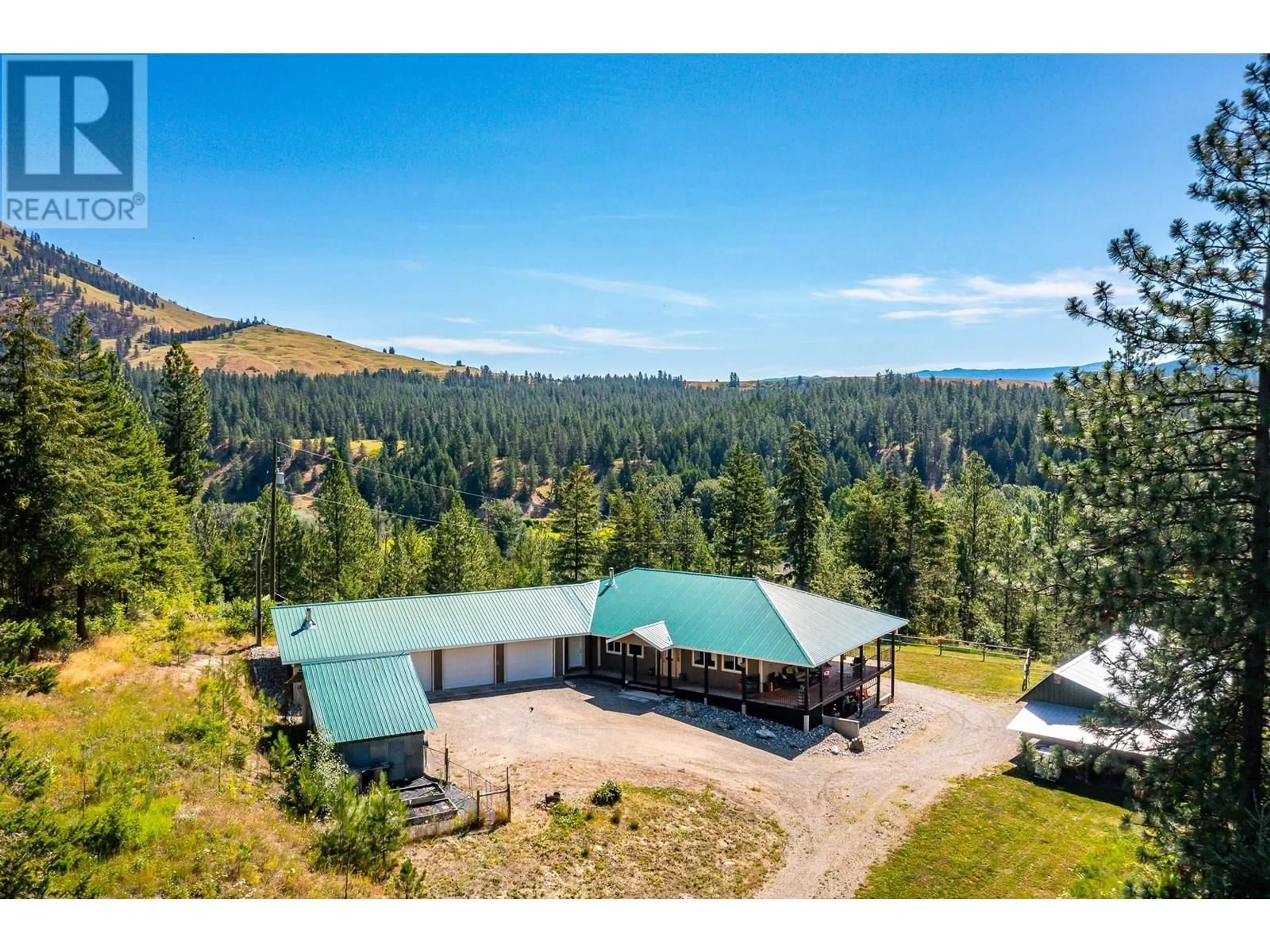 A pic from outside/outdoor area/front of a property/back of a property/a pic from drone, mountain view for 3186 SALMON RIVER ROAD, Salmon Arm British Columbia V1E3H9
