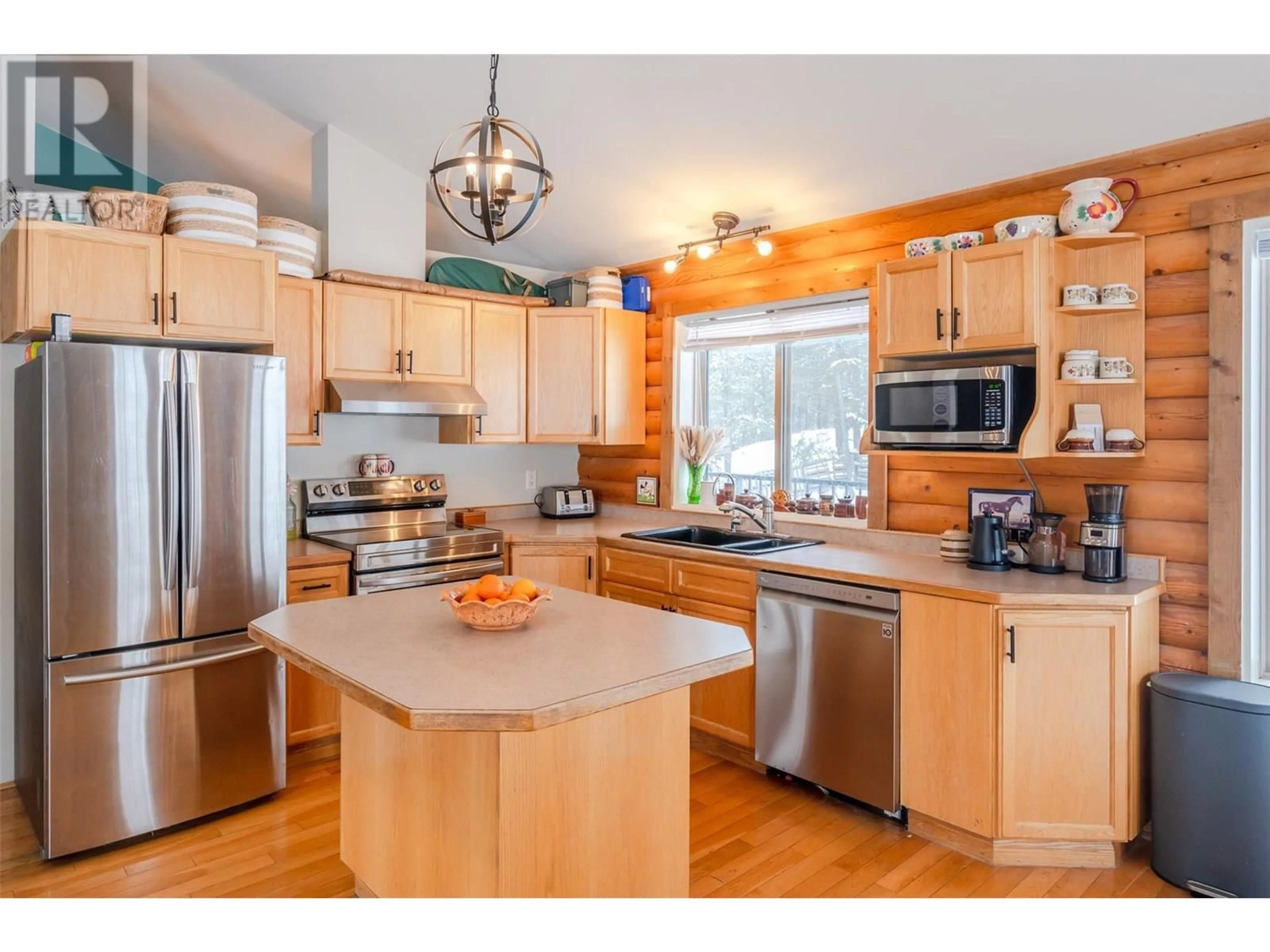 Open concept kitchen, wood/laminate floor for 105 SADDLEHORN DRIVE, Kaleden British Columbia V0H1K0