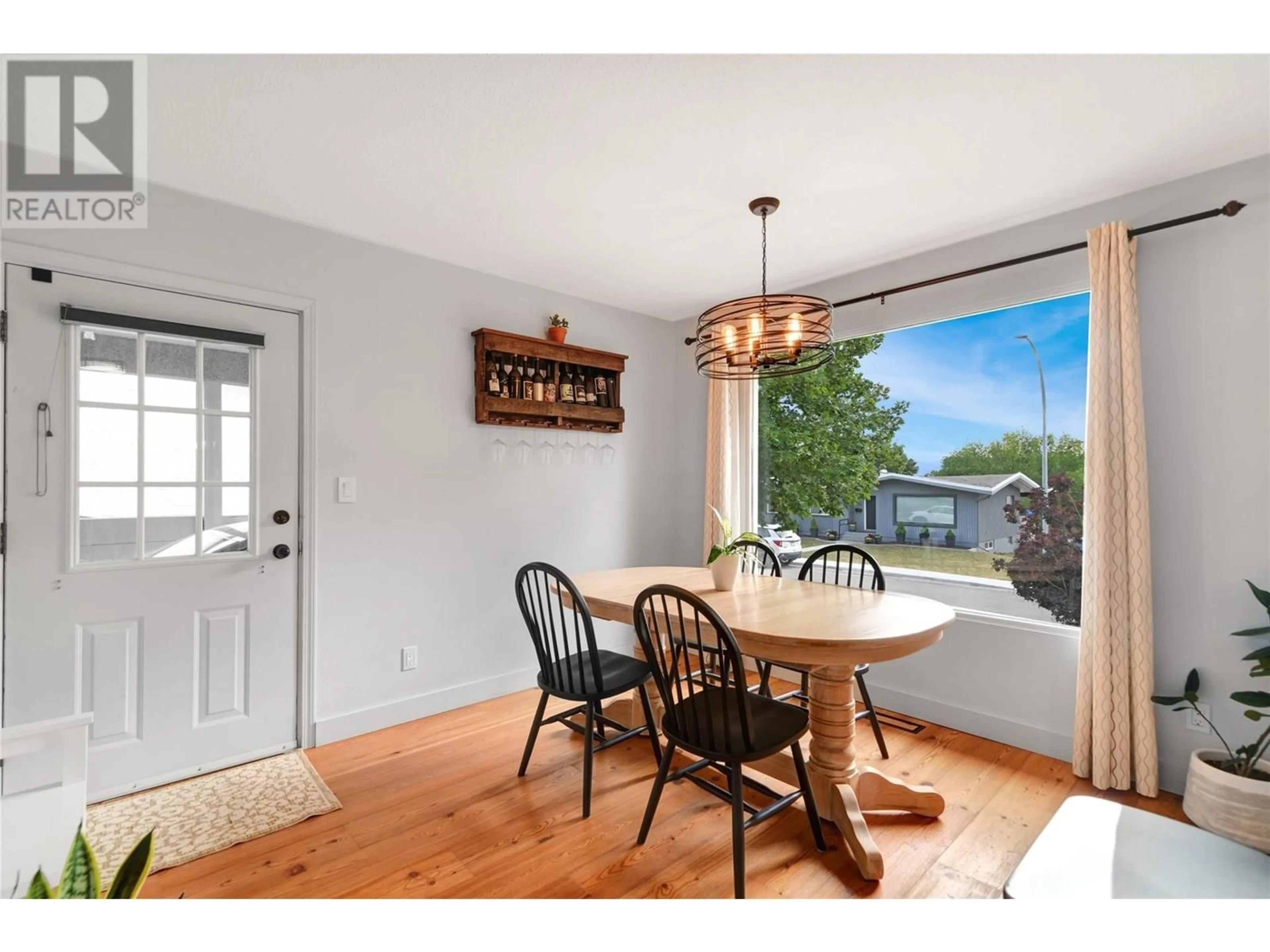 Dining room, wood/laminate floor for 3701 14 STREET, Vernon British Columbia V1T3V1