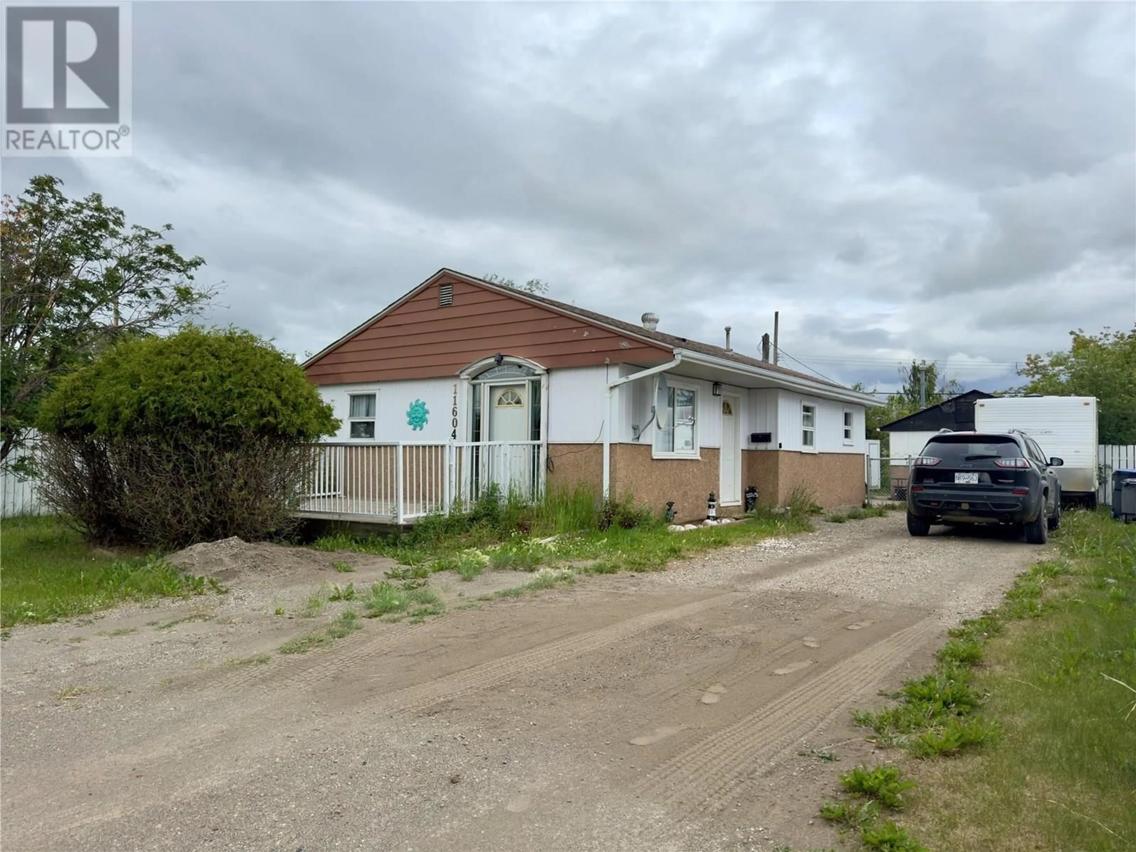 A pic from outside/outdoor area/front of a property/back of a property/a pic from drone, building for 11604 10 STREET, Dawson Creek British Columbia V1G3V3