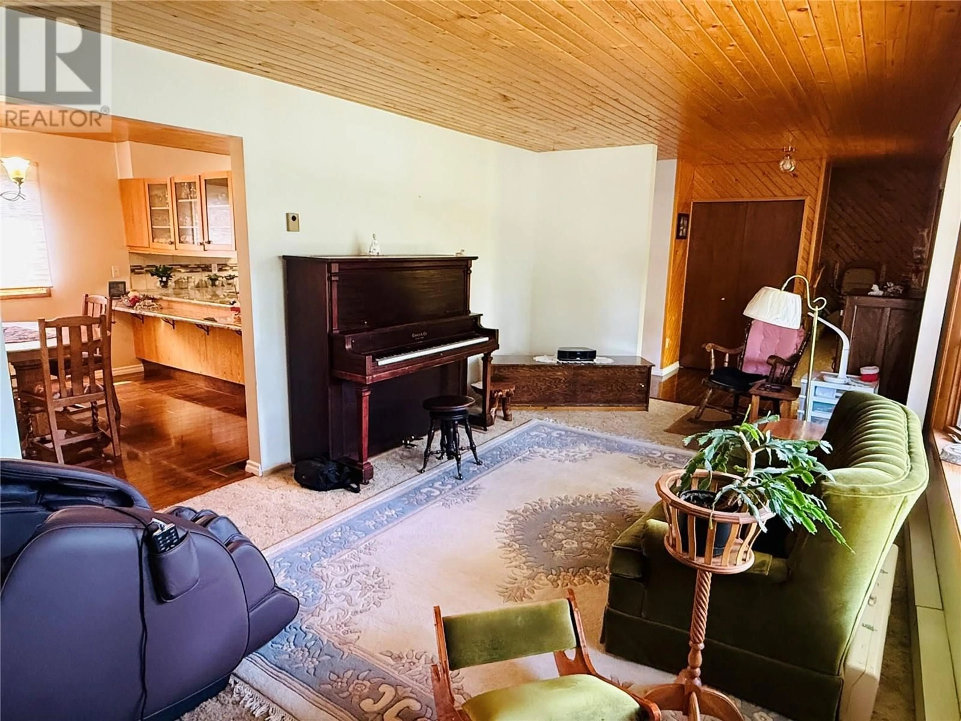 Living room with furniture, wood/laminate floor for 1410 10A AVENUE, Invermere British Columbia V0A1K0