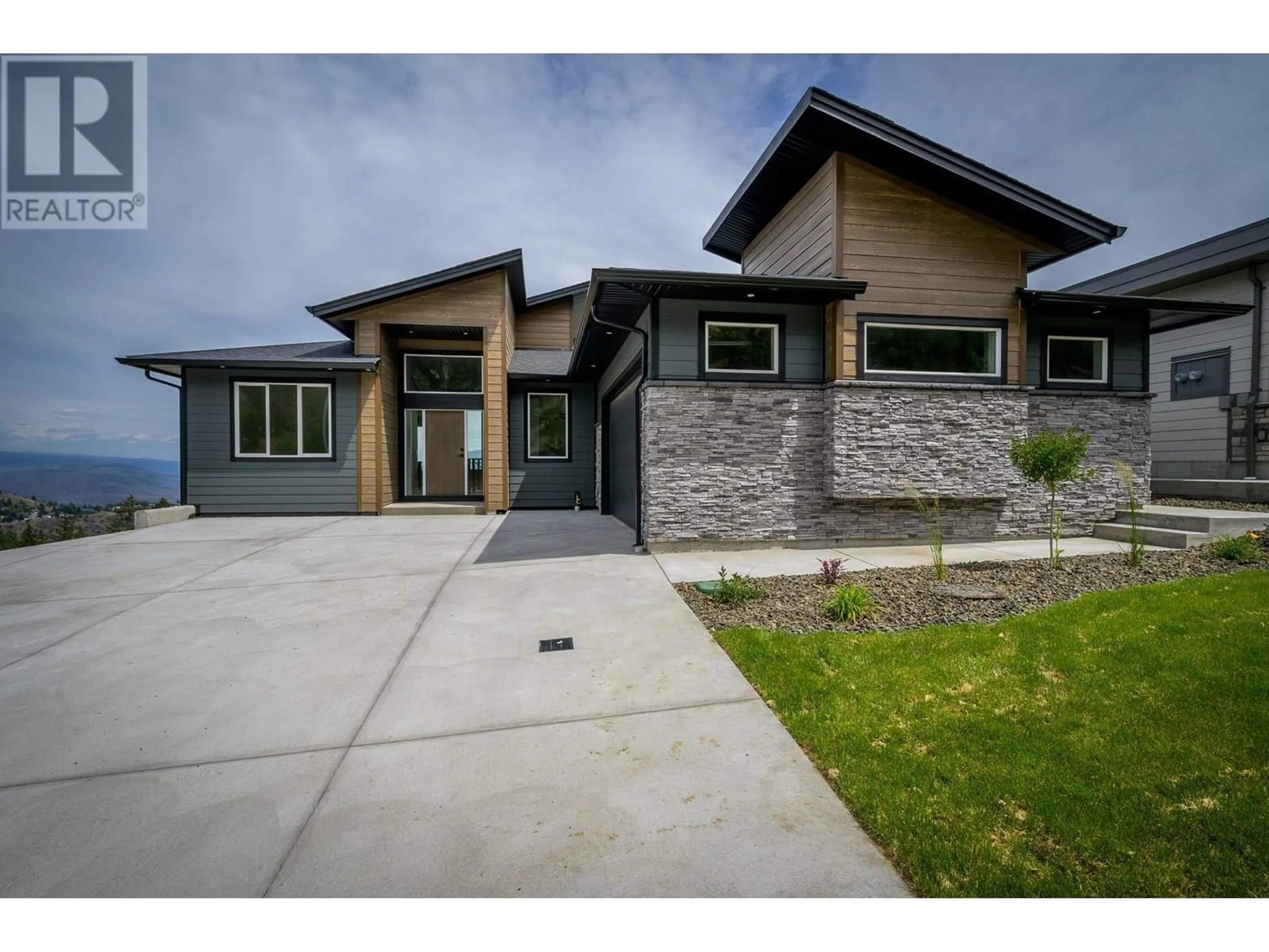 Home with brick exterior material, street for 2138 LINFIELD DRIVE, Kamloops British Columbia V1S0G3