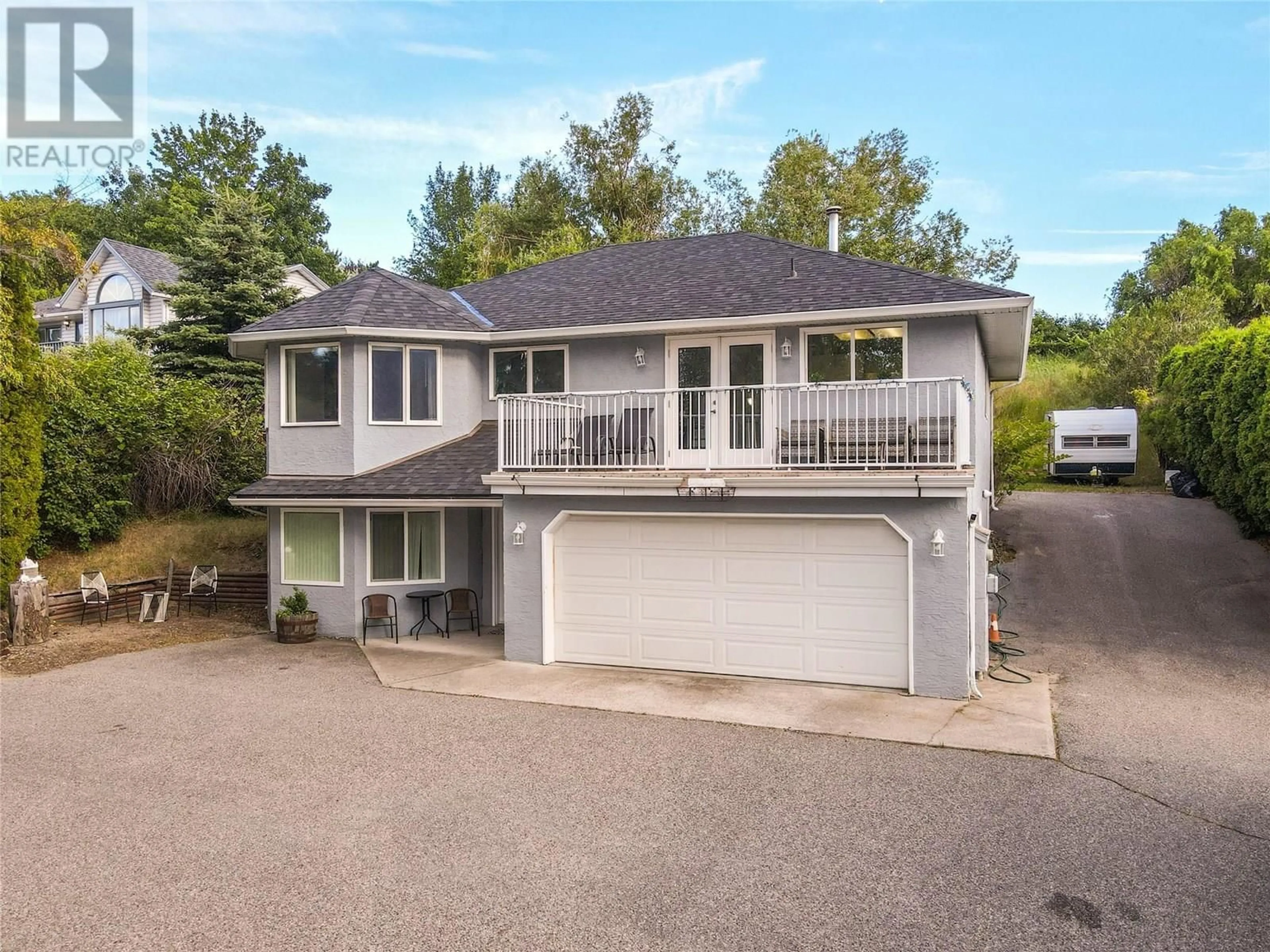 A pic from outside/outdoor area/front of a property/back of a property/a pic from drone, unknown for 1149 HUDSON ROAD, West Kelowna British Columbia V1Z1J2