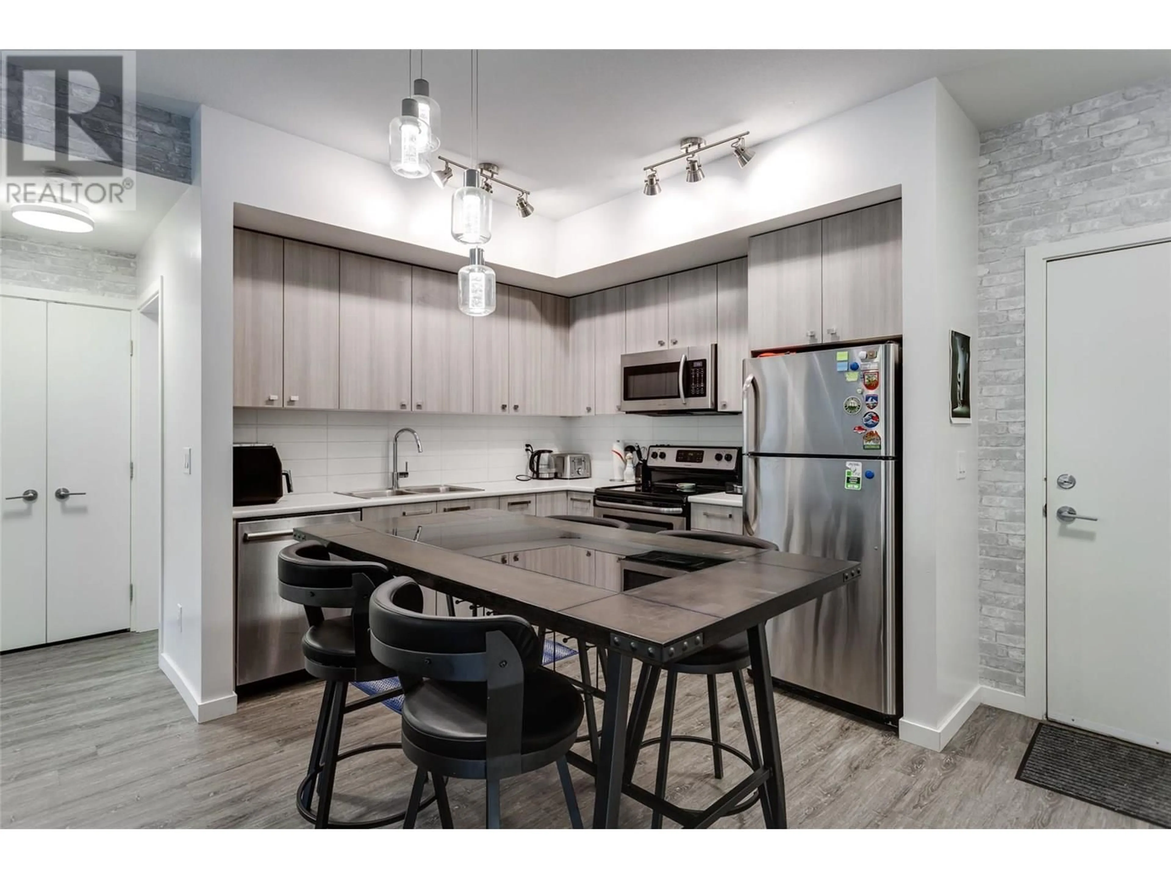 Open concept kitchen, unknown for 118 - 935 ACADEMY WAY, Kelowna British Columbia V1V3A9