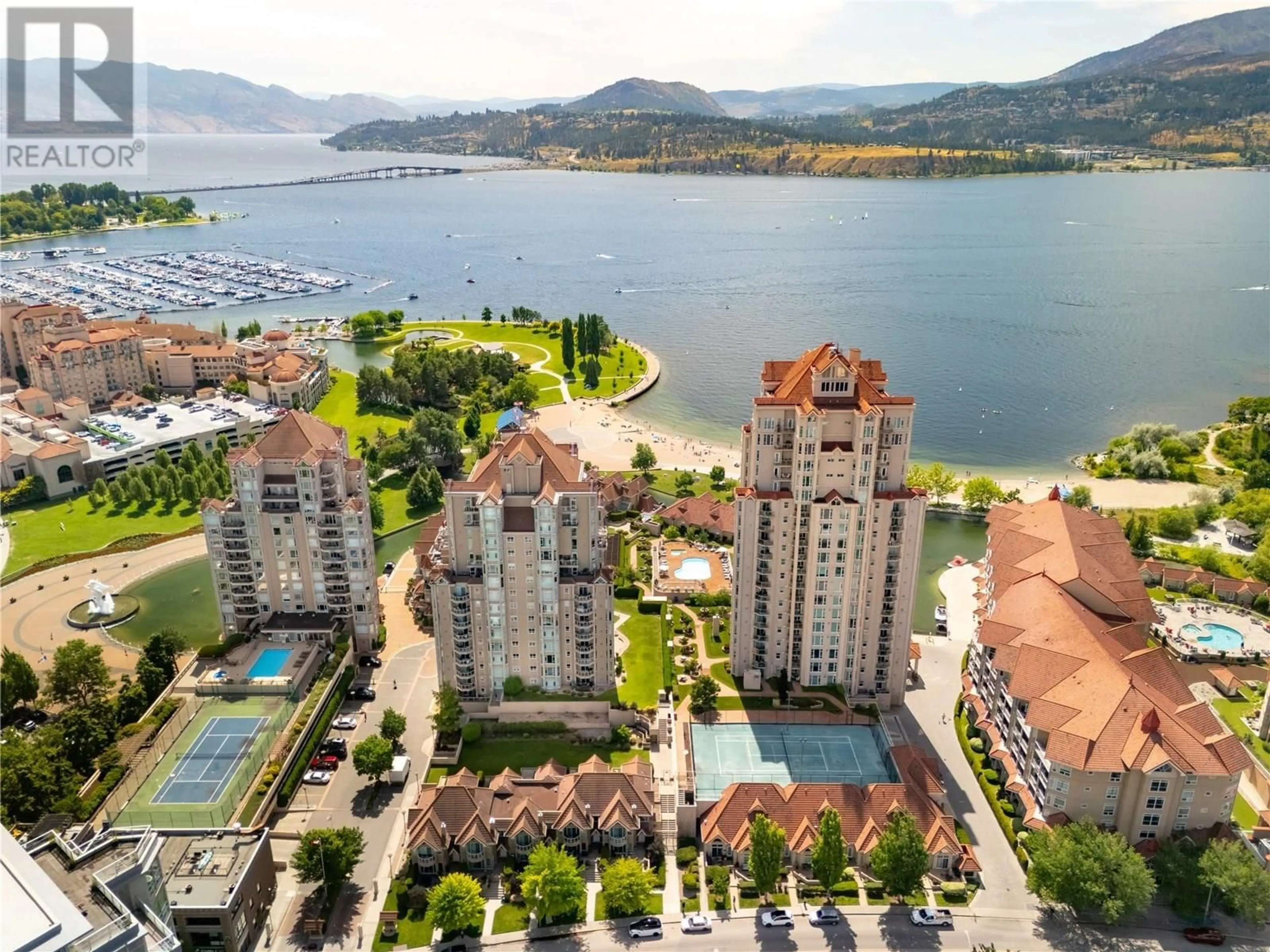 A pic from outside/outdoor area/front of a property/back of a property/a pic from drone, water/lake/river/ocean view for 1003 - 1152 SUNSET DRIVE, Kelowna British Columbia V1Y9R7