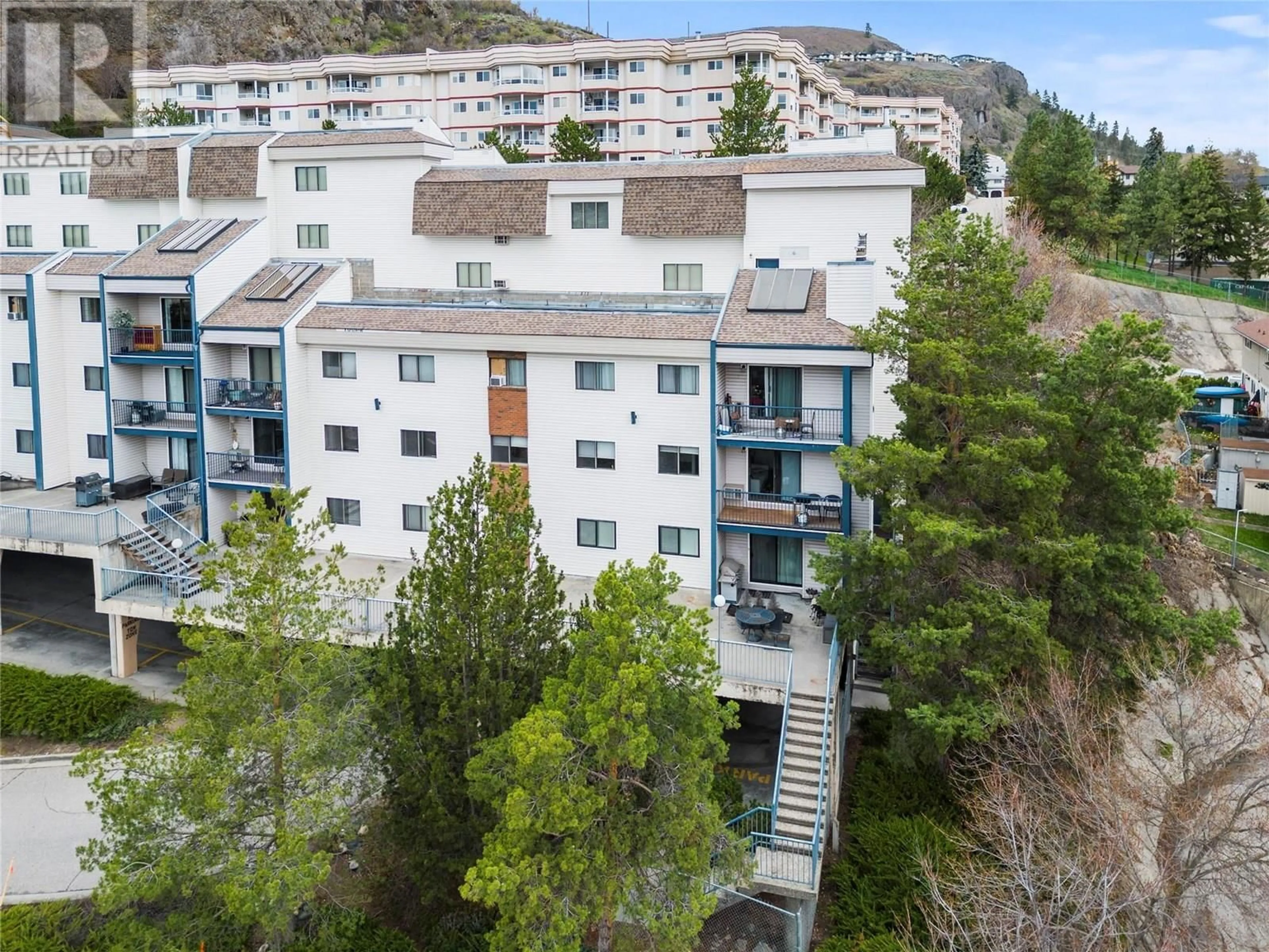 A pic from outside/outdoor area/front of a property/back of a property/a pic from drone, city buildings view from balcony for 210 - 3901 32 AVENUE, Vernon British Columbia V1T8M3