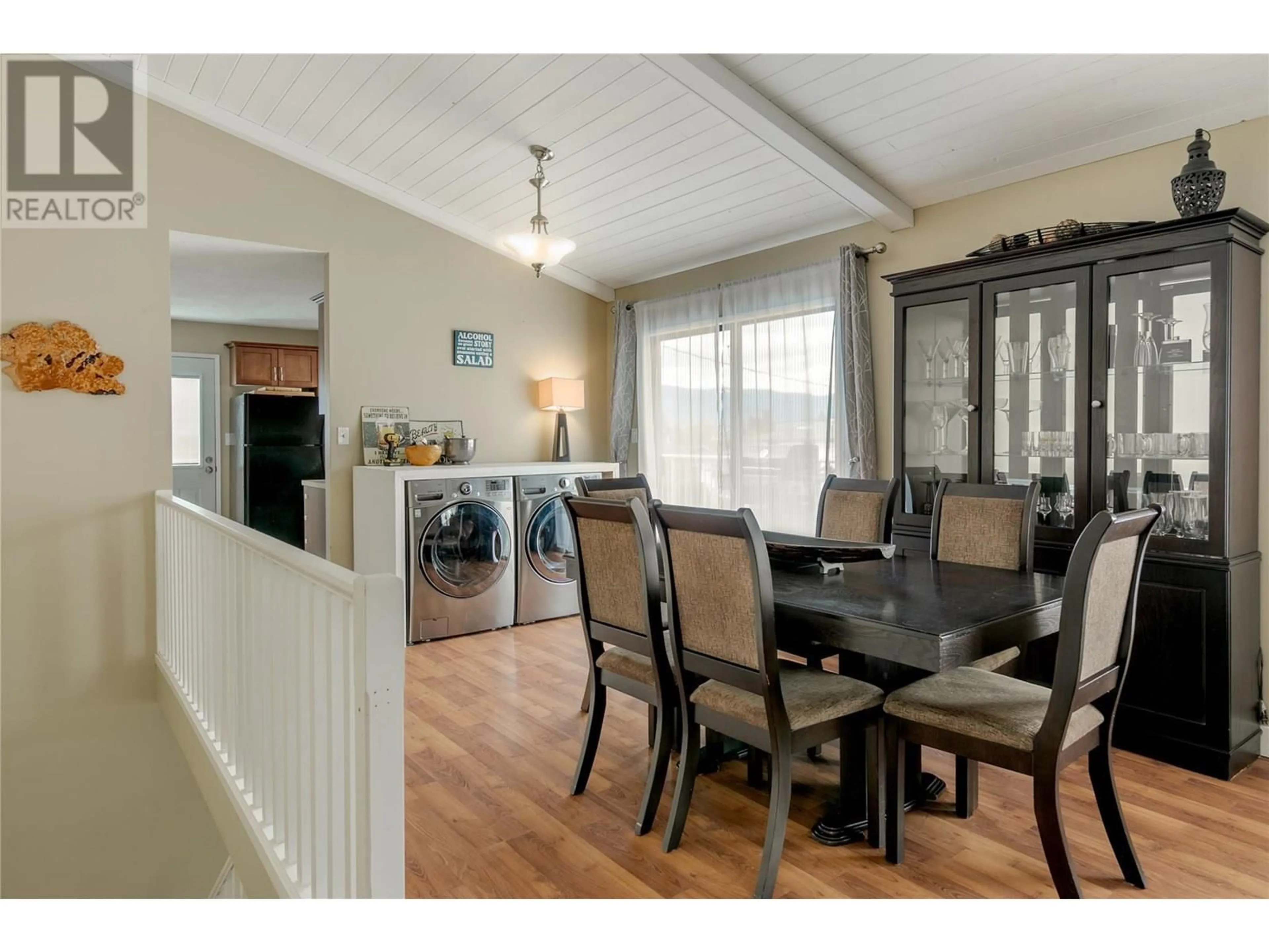 Dining room, wood/laminate floor for 875 HAMMER AVENUE, Kelowna British Columbia V1W2B7