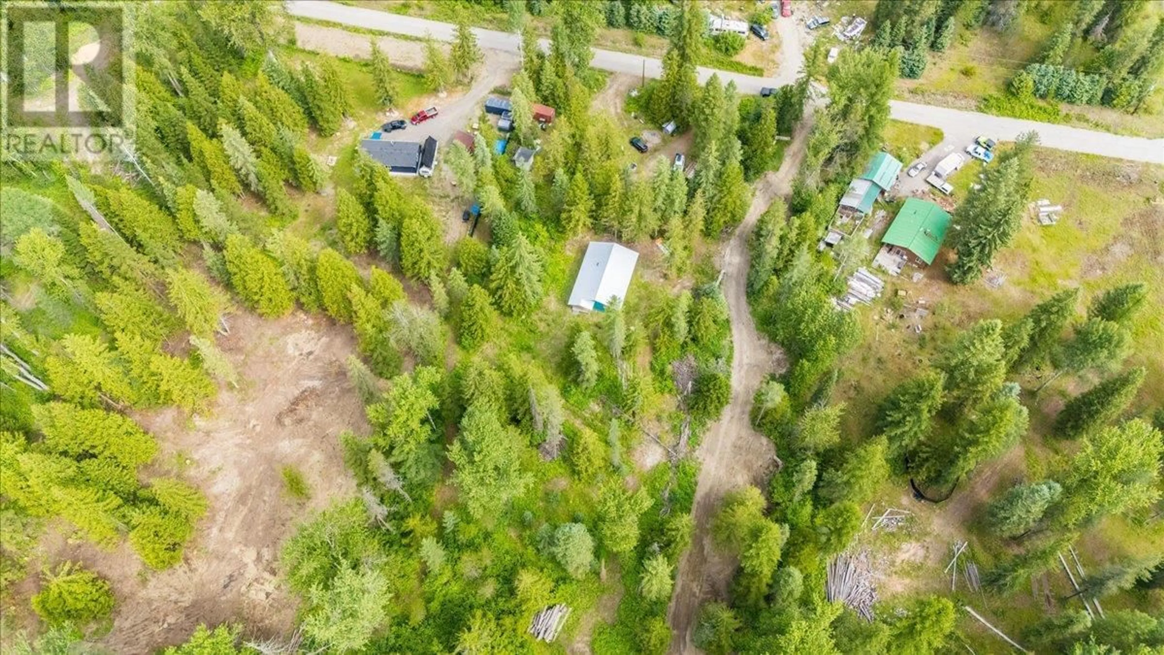 A pic from outside/outdoor area/front of a property/back of a property/a pic from drone, forest/trees view for 116 LINESS ROAD, Salmo British Columbia V0G1Z0