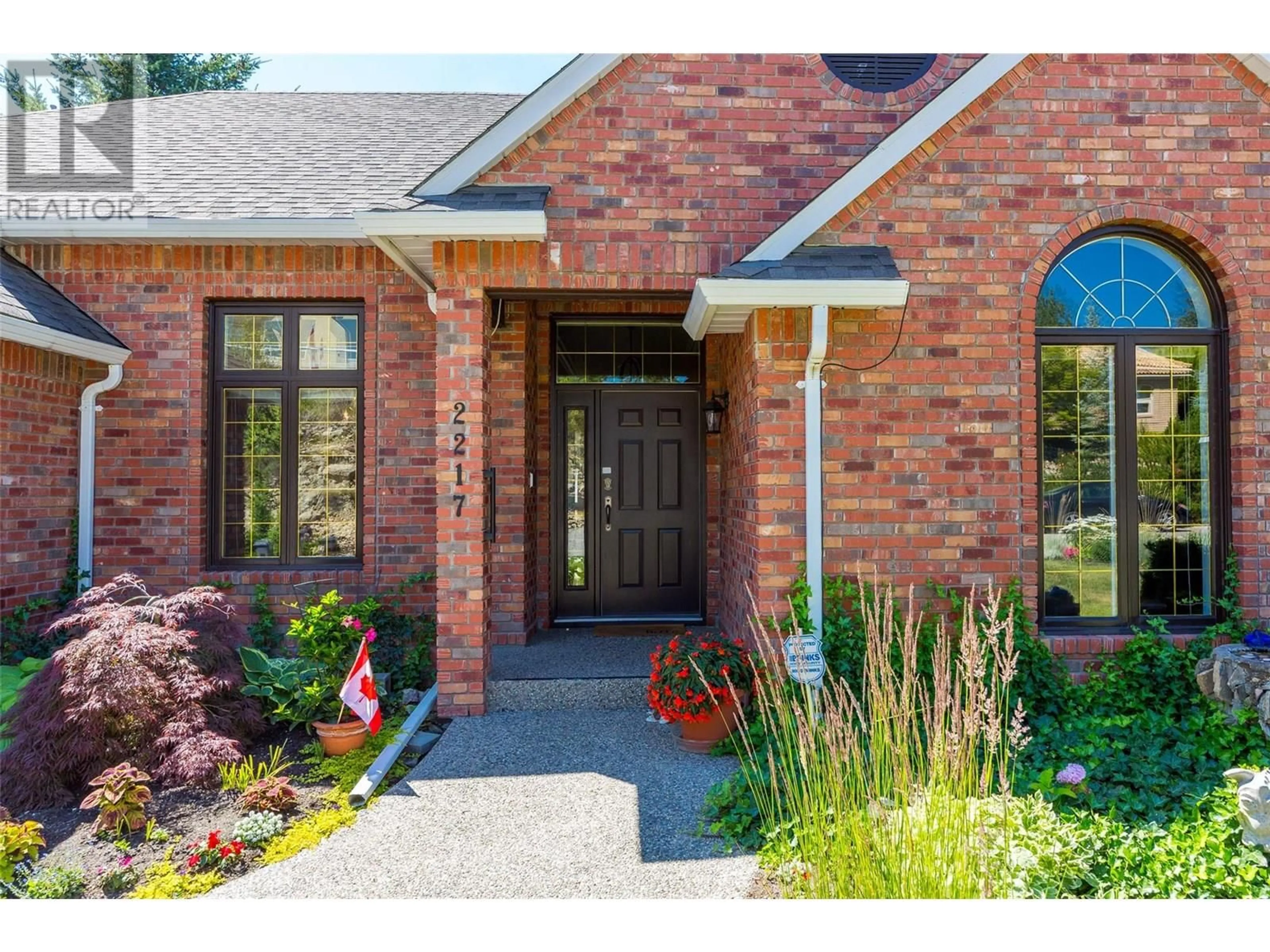 Home with brick exterior material, street for 2217 BRECKENRIDGE COURT, Kelowna British Columbia V1V1W2