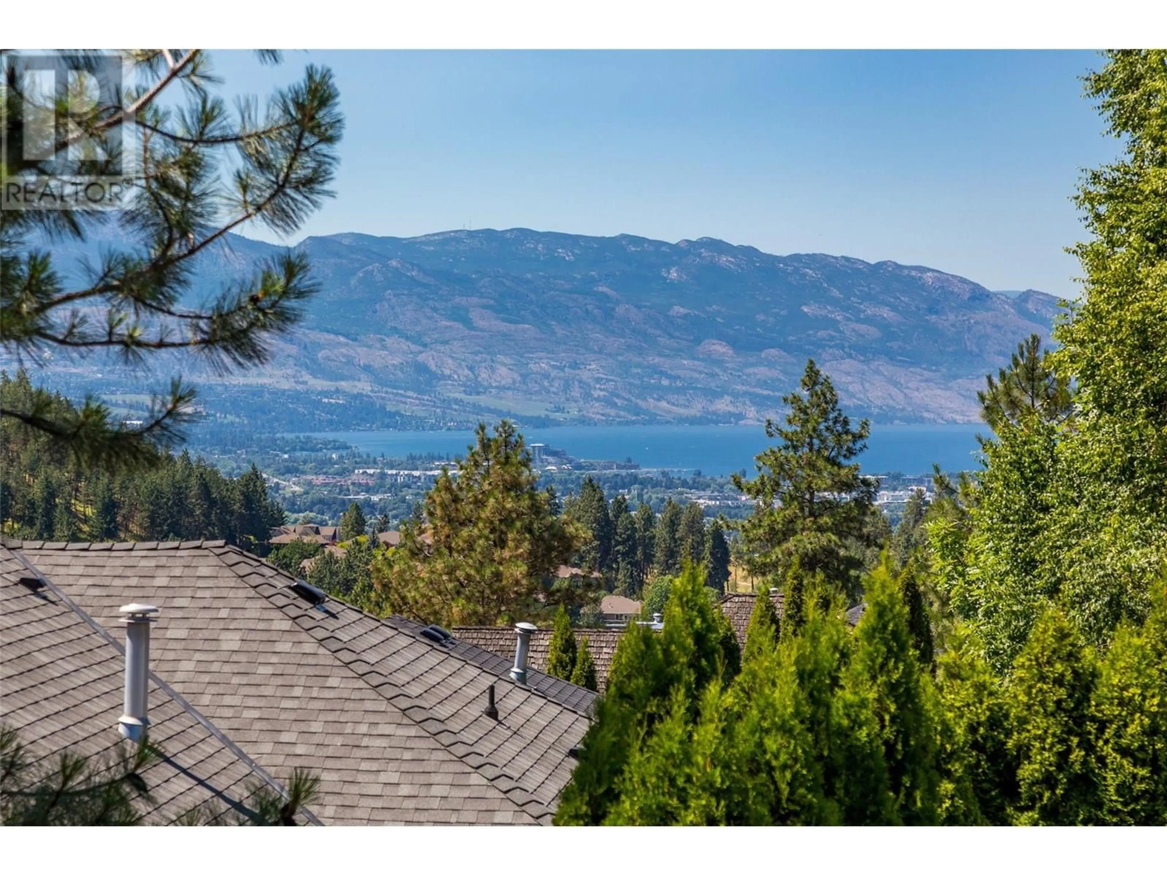 A pic from outside/outdoor area/front of a property/back of a property/a pic from drone, water/lake/river/ocean view for 2217 BRECKENRIDGE COURT, Kelowna British Columbia V1V1W2