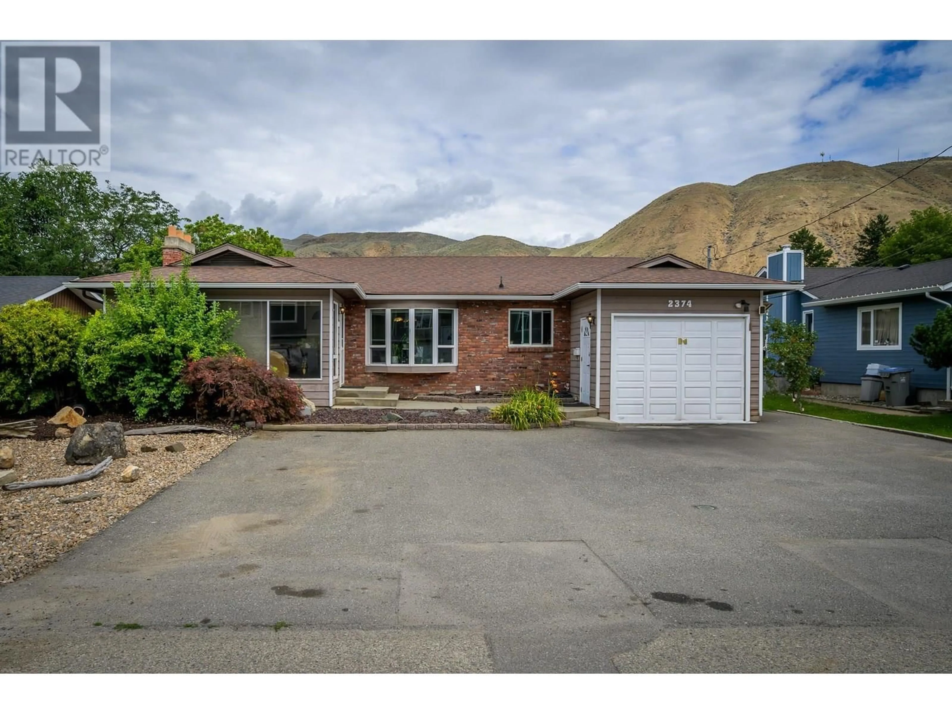 Home with brick exterior material, street for 2374 PARKCREST AVENUE, Kamloops British Columbia V2B4Y3