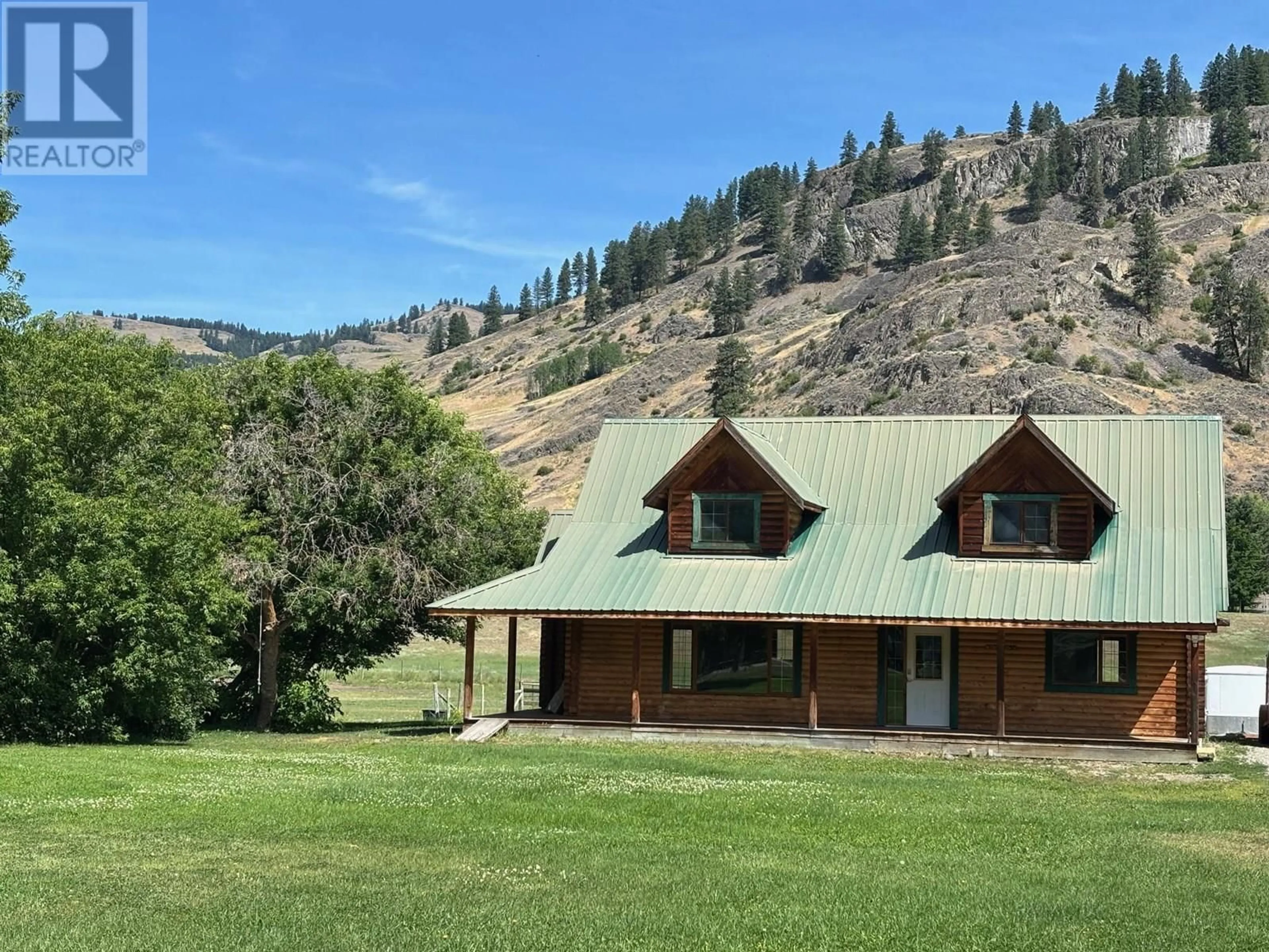 A pic from outside/outdoor area/front of a property/back of a property/a pic from drone, mountain view for 937 THIRTEENTH AVENUE, Midway British Columbia V0H1M0