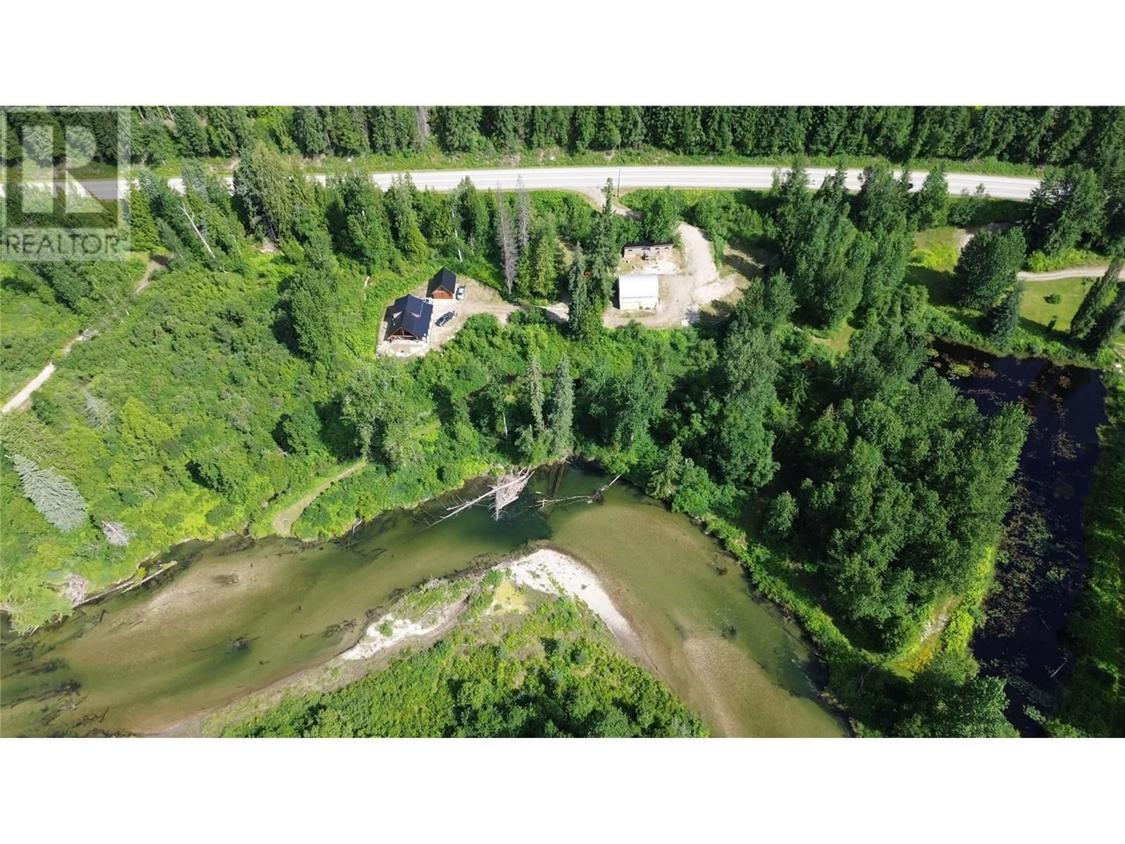 A pic from outside/outdoor area/front of a property/back of a property/a pic from drone, water/lake/river/ocean view for 5860 TRANS CANADA HWY 1 OTHER, Malakwa British Columbia V0E2J0