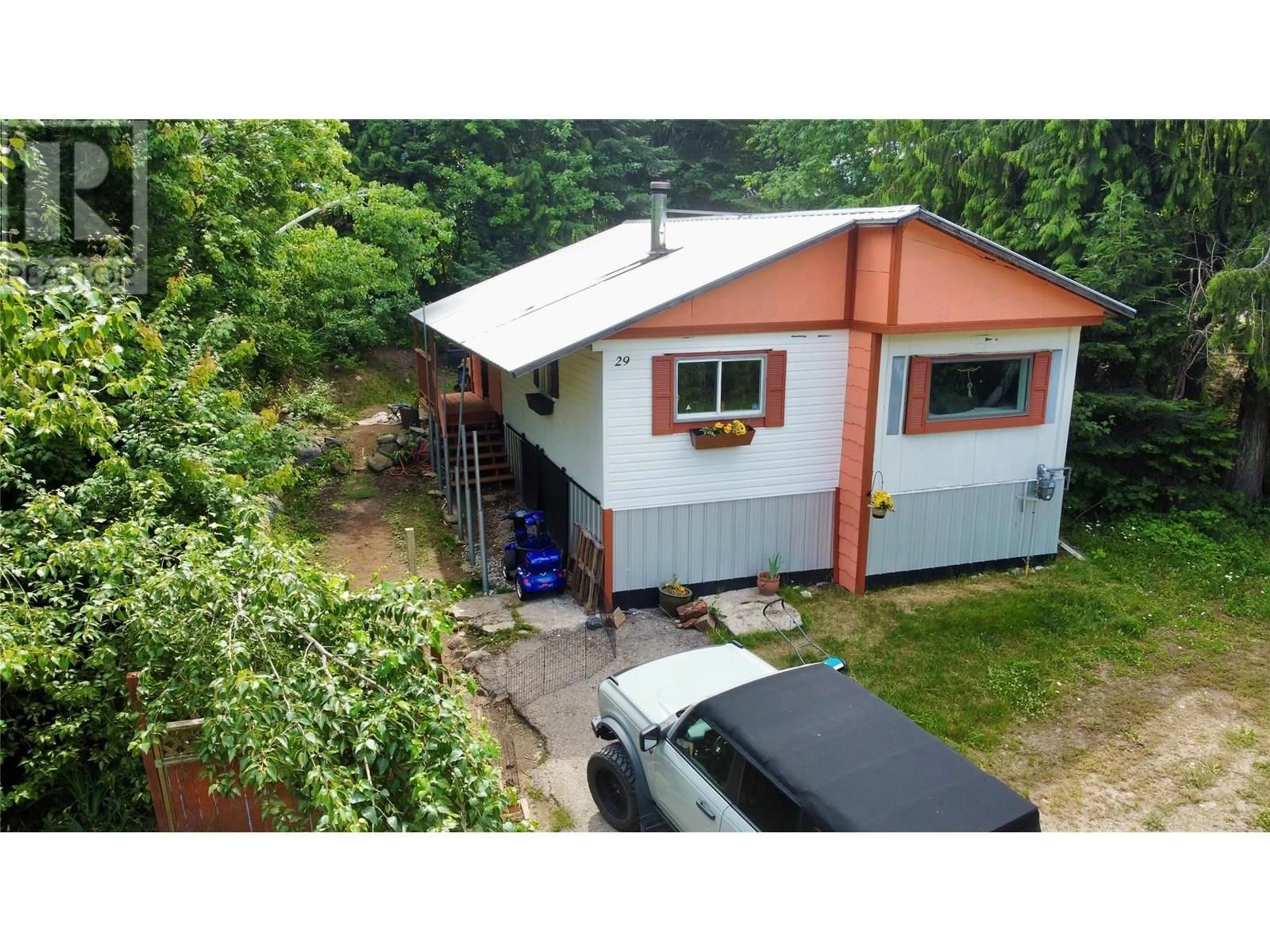 A pic from outside/outdoor area/front of a property/back of a property/a pic from drone, building for 29 - 891 MONTE VISTA DRIVE, Rossland British Columbia V0G1Y0