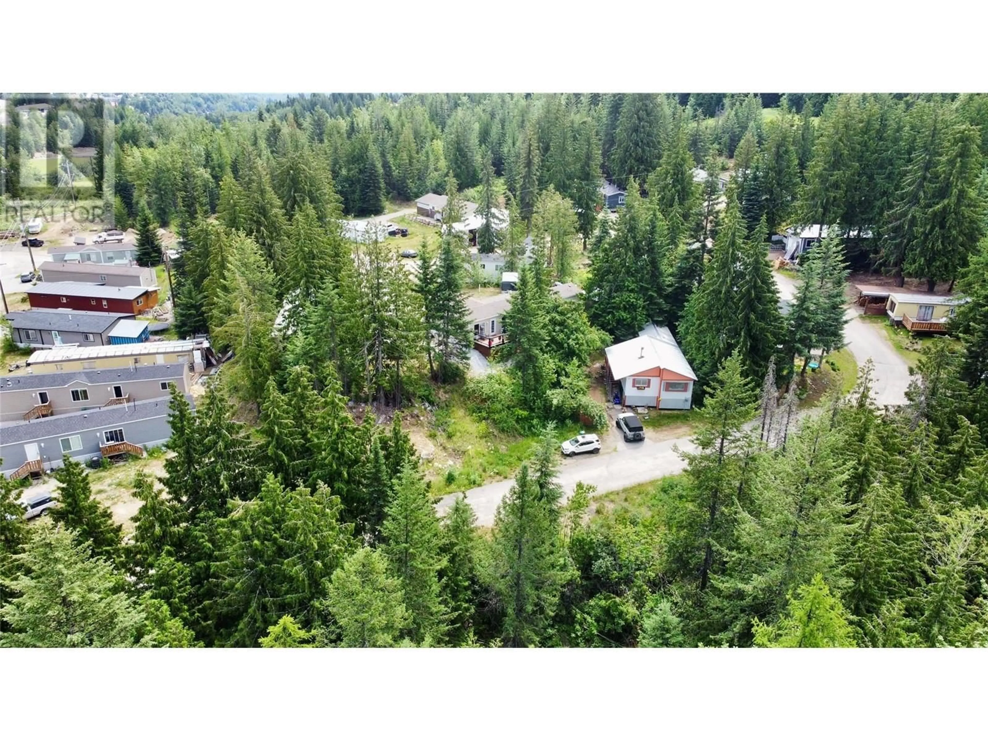 A pic from outside/outdoor area/front of a property/back of a property/a pic from drone, forest/trees view for 29 - 891 MONTE VISTA DRIVE, Rossland British Columbia V0G1Y0