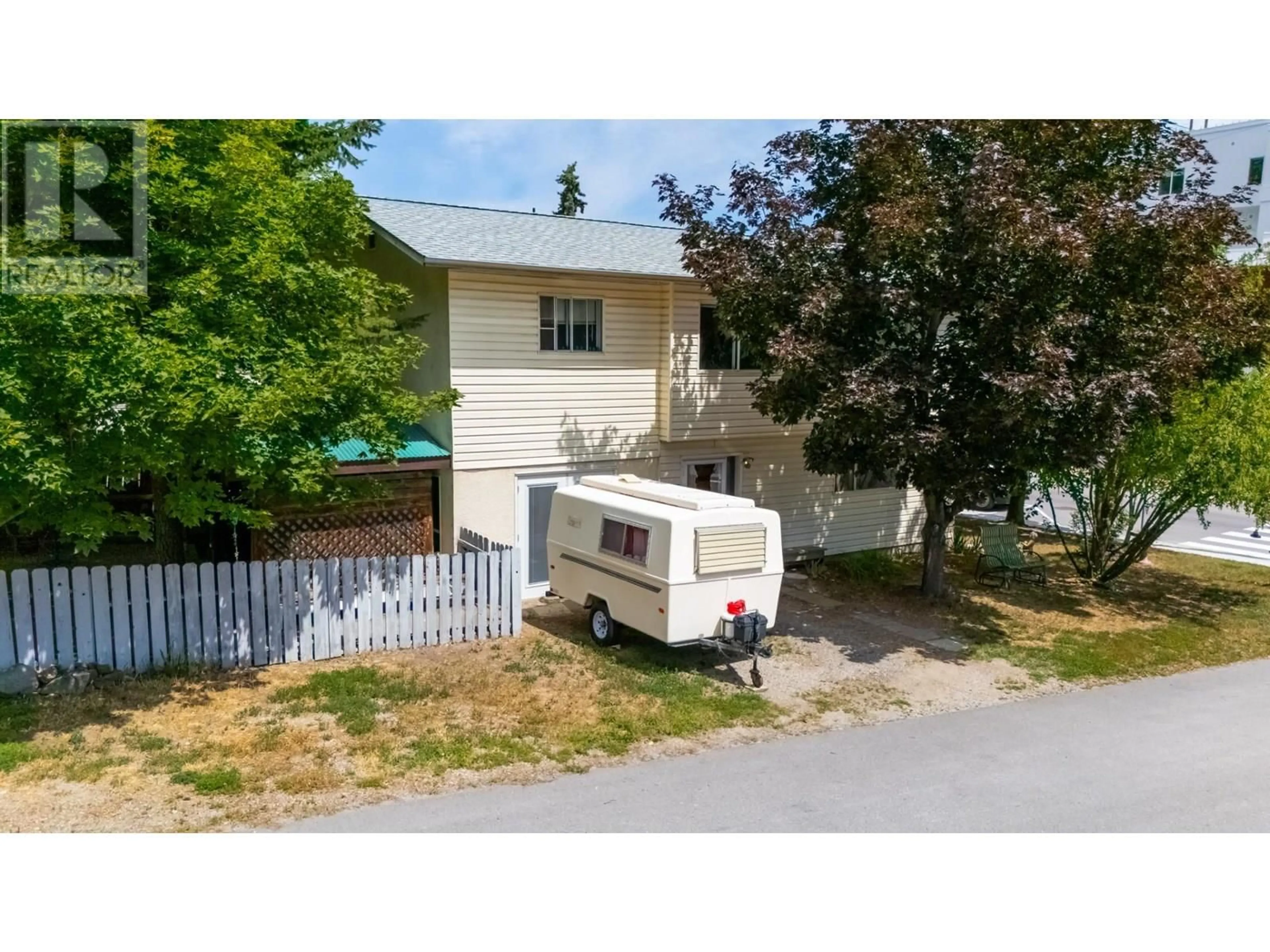 A pic from outside/outdoor area/front of a property/back of a property/a pic from drone, street for 13410 LAKESHORE DRIVE, Summerland British Columbia V0H1Z1