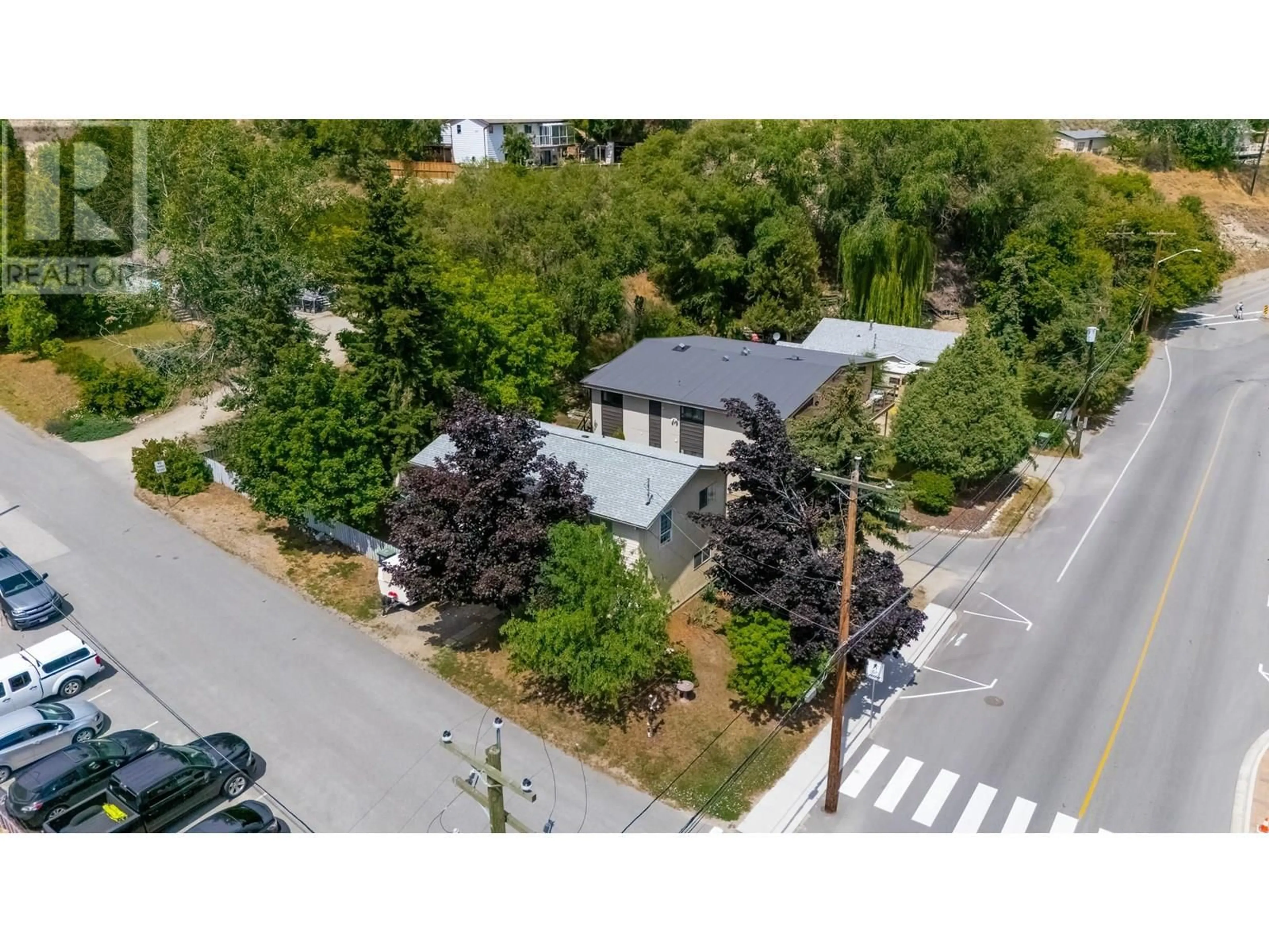 A pic from outside/outdoor area/front of a property/back of a property/a pic from drone, street for 13410 LAKESHORE DRIVE, Summerland British Columbia V0H1Z1