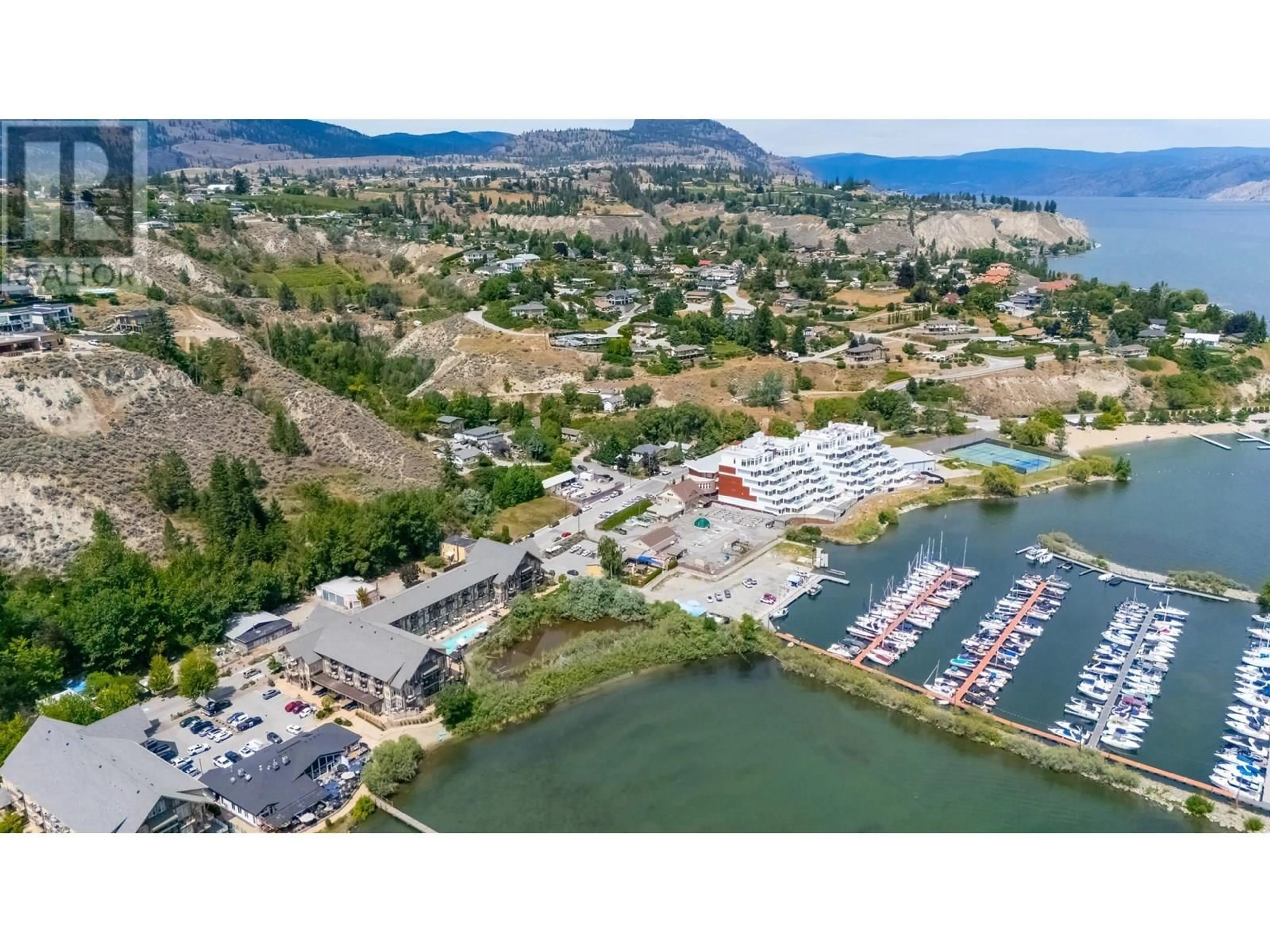 A pic from outside/outdoor area/front of a property/back of a property/a pic from drone, water/lake/river/ocean view for 13410 LAKESHORE DRIVE, Summerland British Columbia V0H1Z1