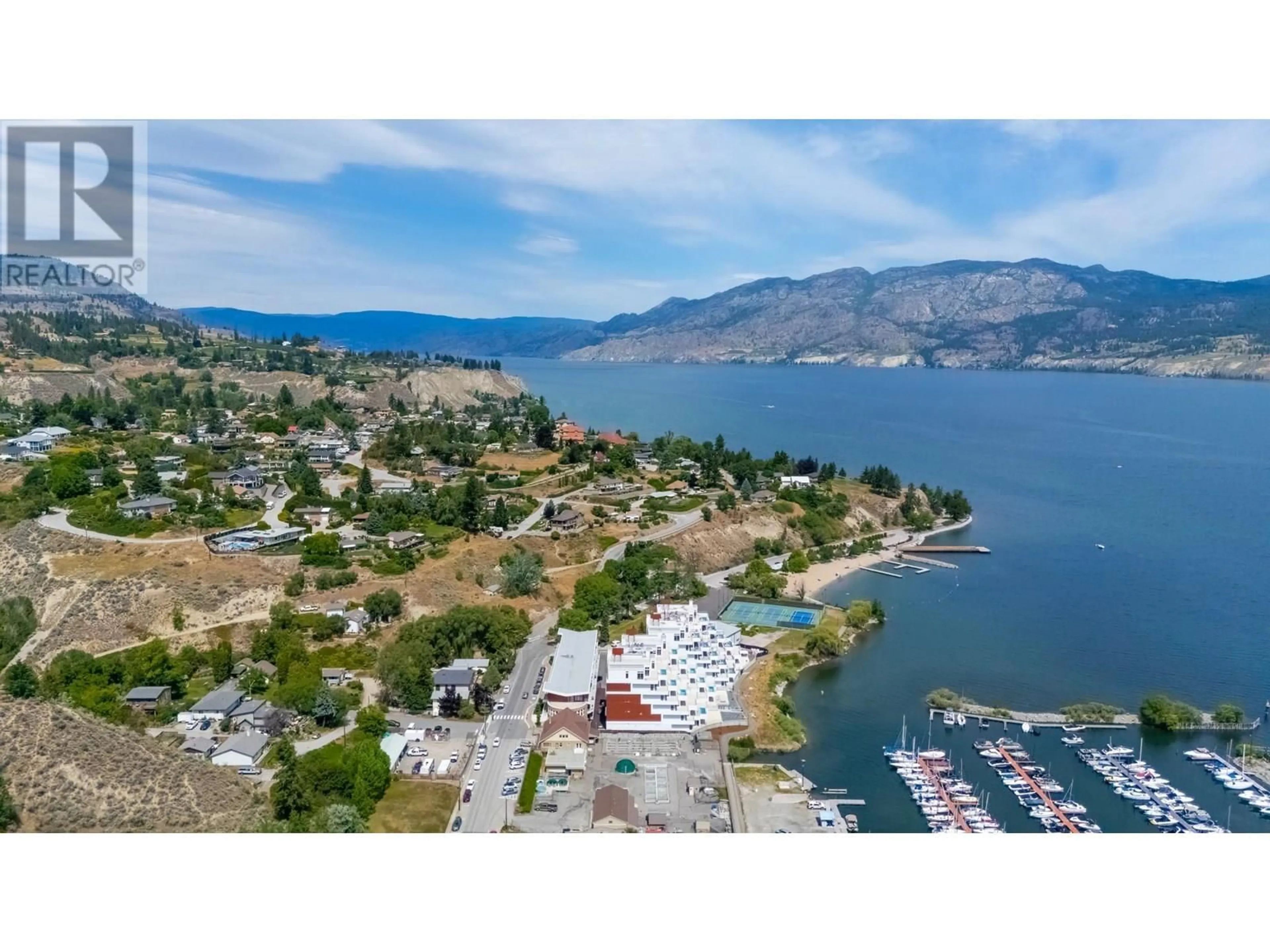 A pic from outside/outdoor area/front of a property/back of a property/a pic from drone, water/lake/river/ocean view for 13410 LAKESHORE DRIVE, Summerland British Columbia V0H1Z1