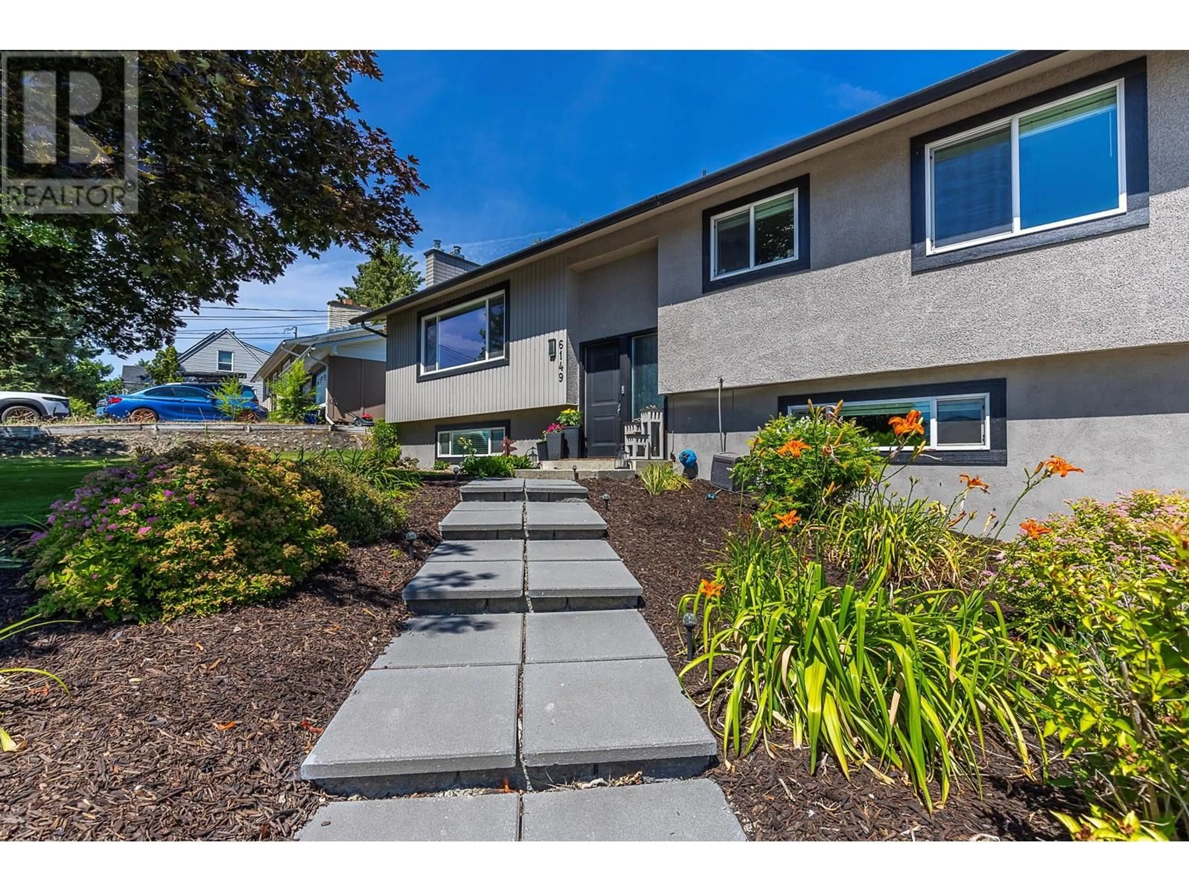 Home with vinyl exterior material, street for 6149 BELLA VISTA ROAD, Vernon British Columbia V1H1B4