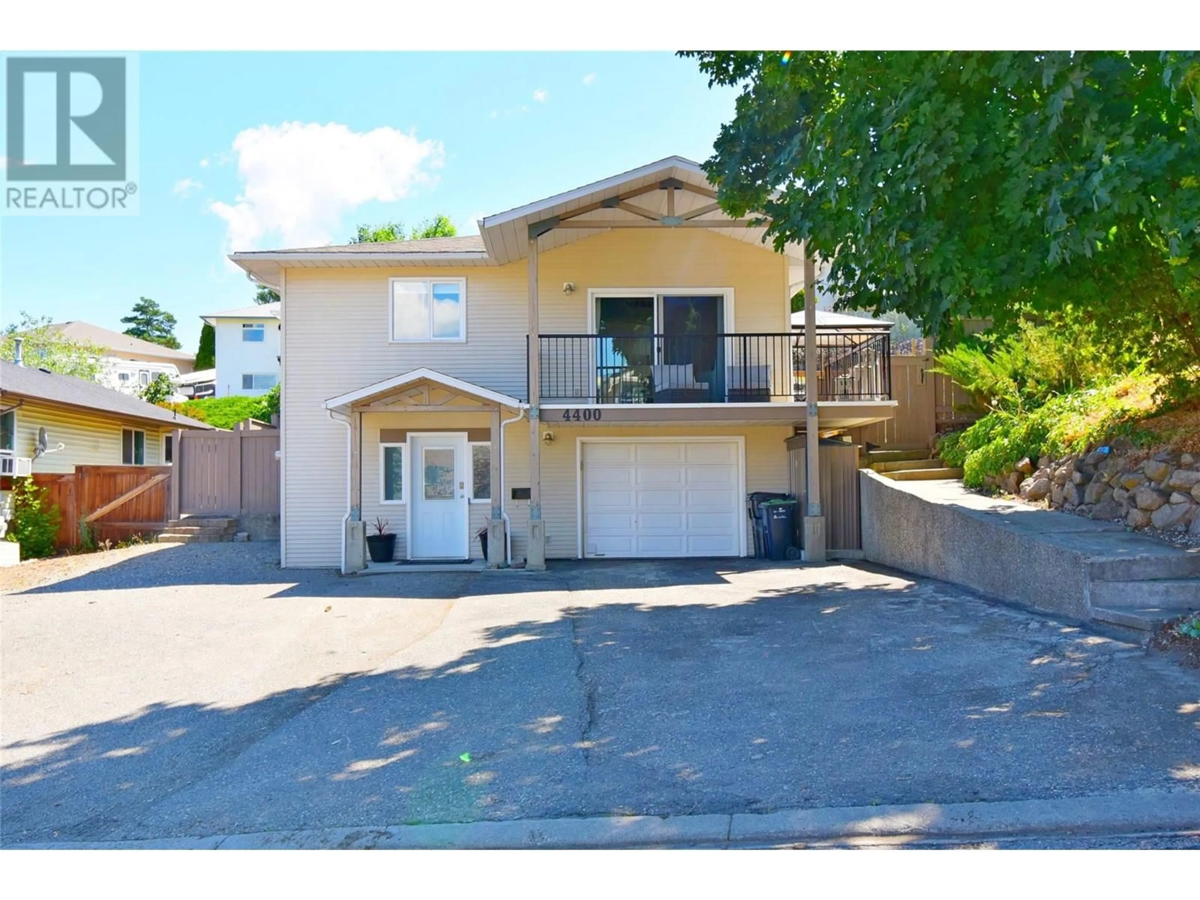 A pic from outside/outdoor area/front of a property/back of a property/a pic from drone, street for 4400 BELLEVUE DRIVE, Vernon British Columbia V1T9C1