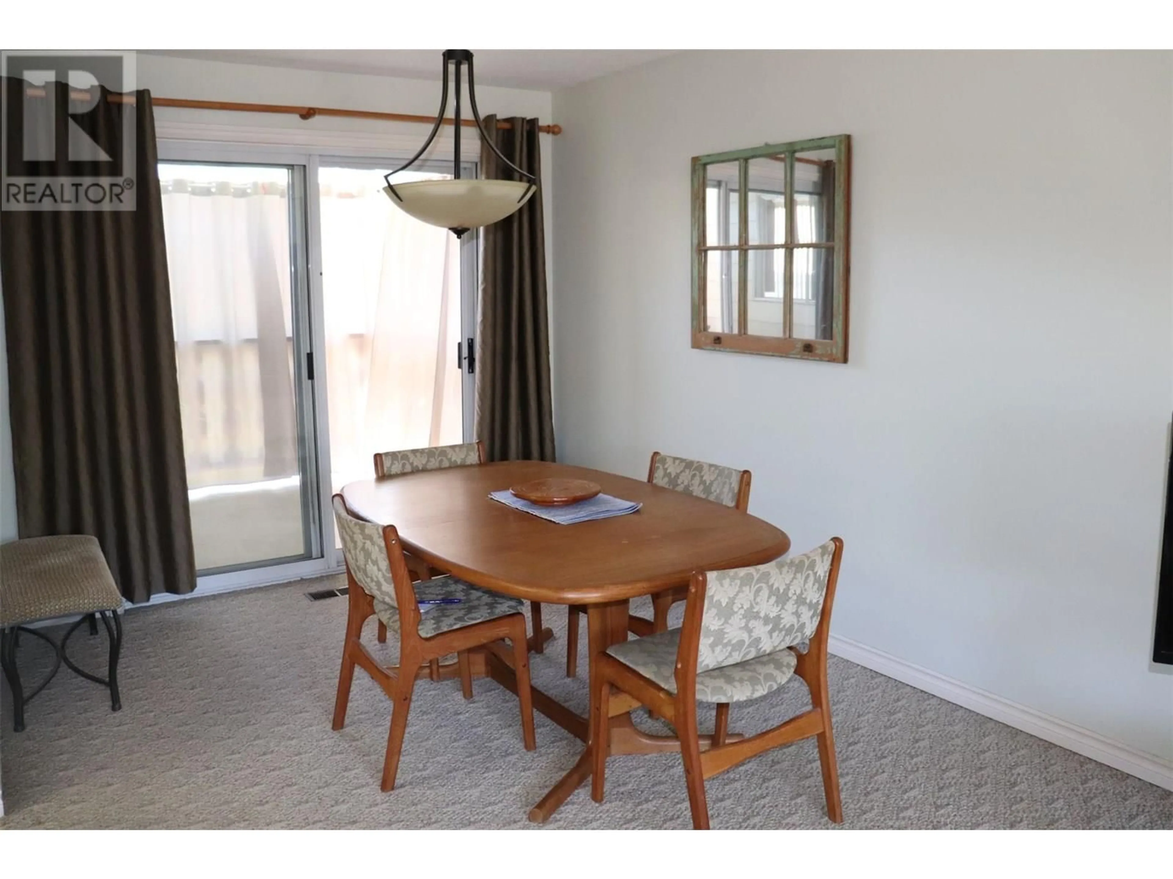 Dining room, wood/laminate floor for 650 2ND STREET SOUTHEAST, Salmon Arm British Columbia V1E4H2