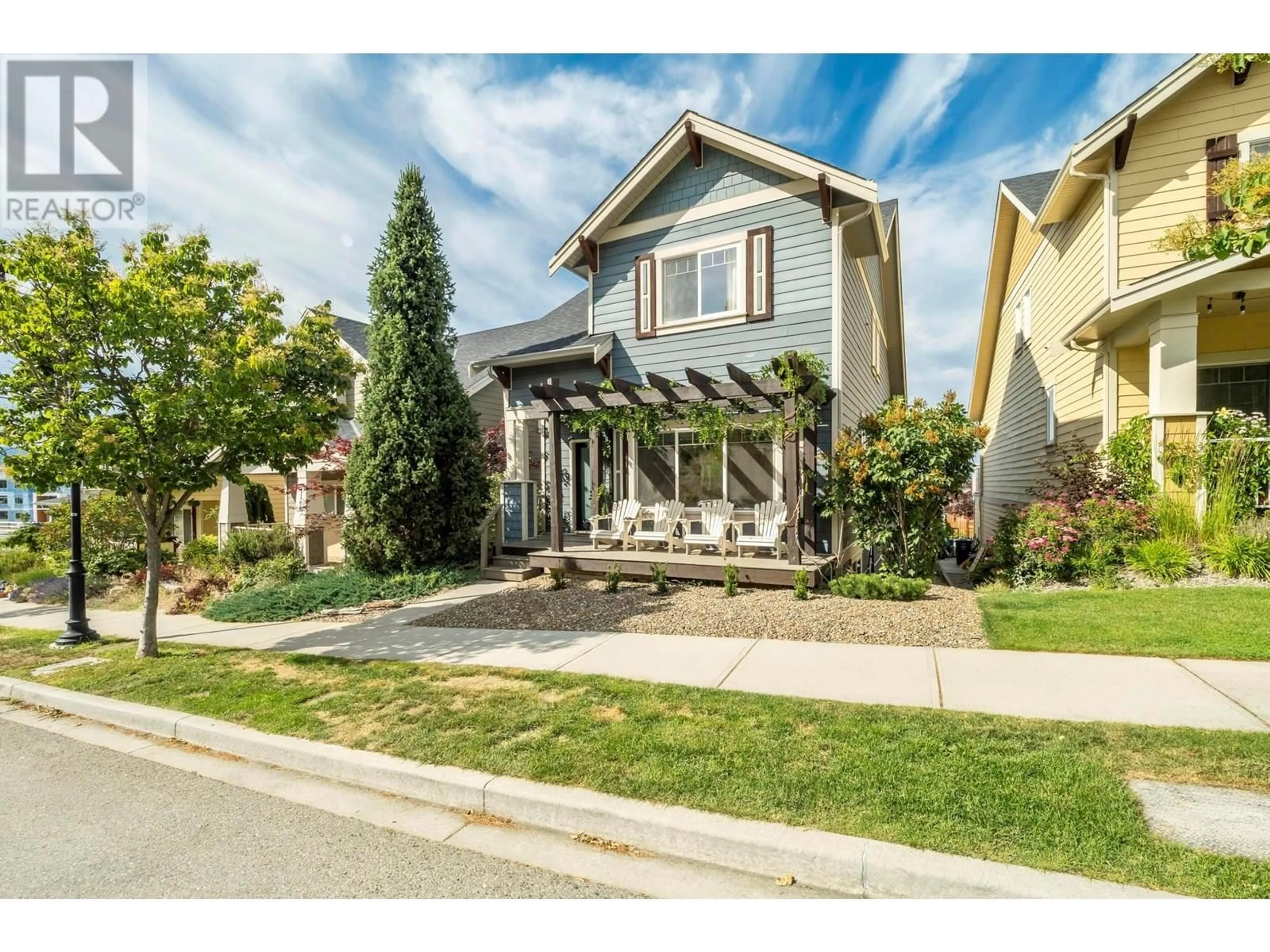 Home with vinyl exterior material, street for 1174 BERGAMOT AVENUE, Kelowna British Columbia V1W5K5