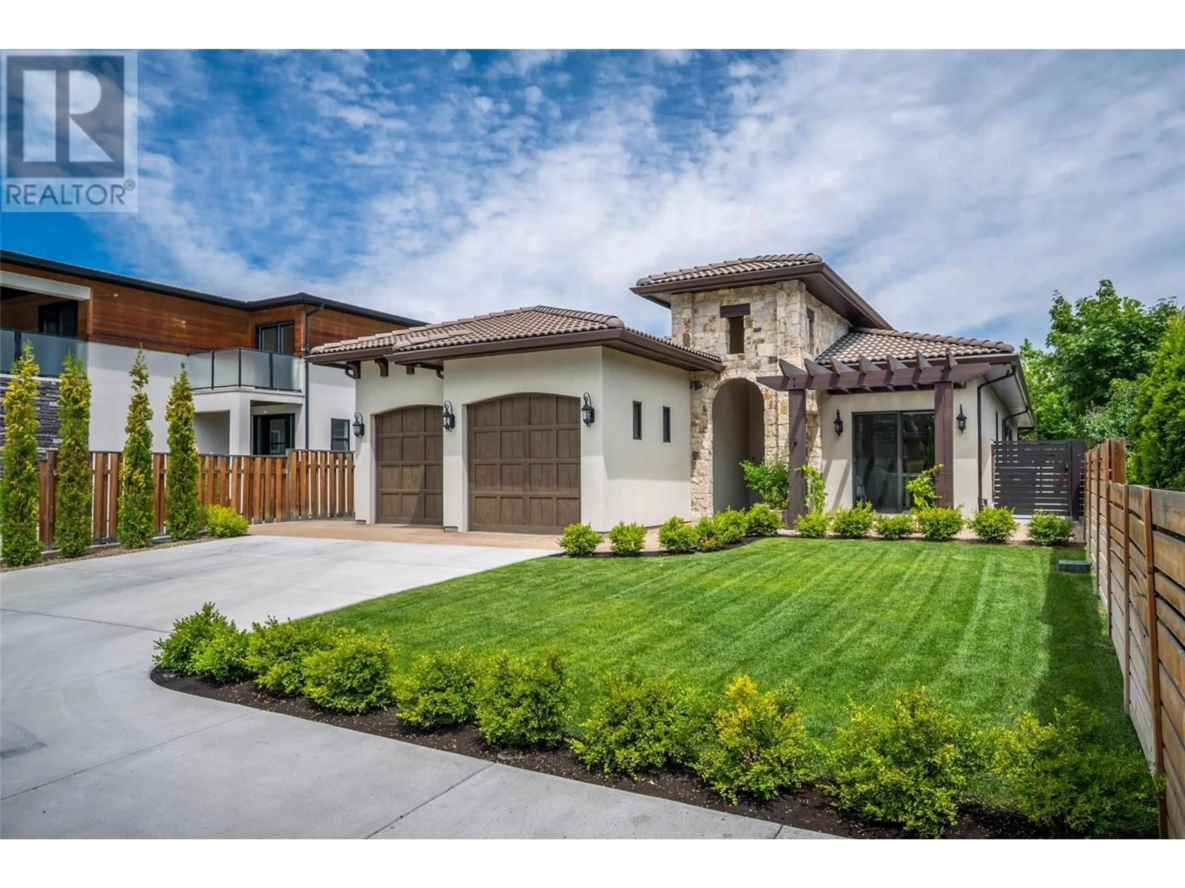 Home with brick exterior material, street for 3567 LAKESHORE ROAD, Kelowna British Columbia V1W3K1